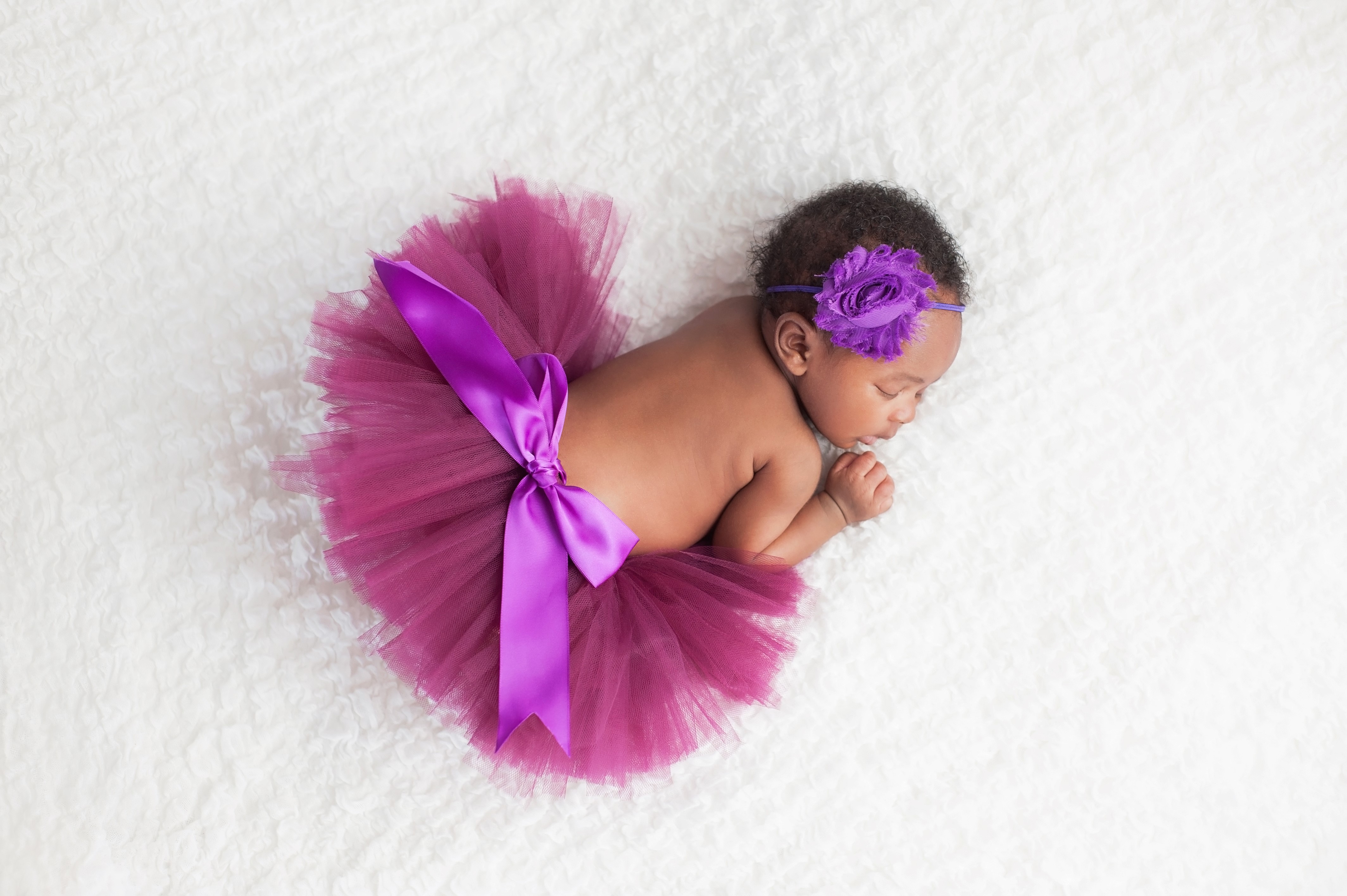 Baby girl in purple tutu sleeping HD Wallpaper