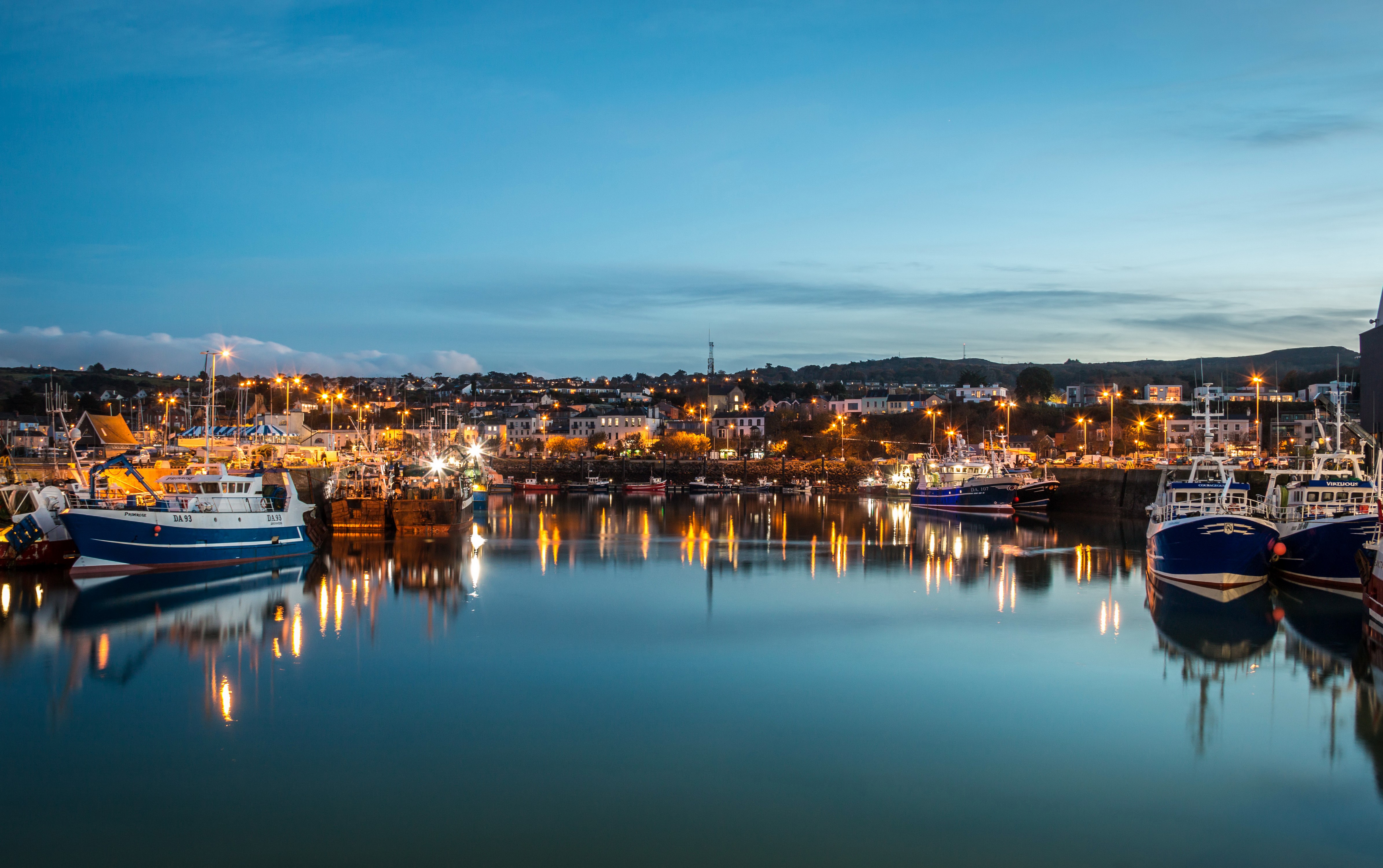 Boats in a harbor at dusk in Ireland HD Wallpaper