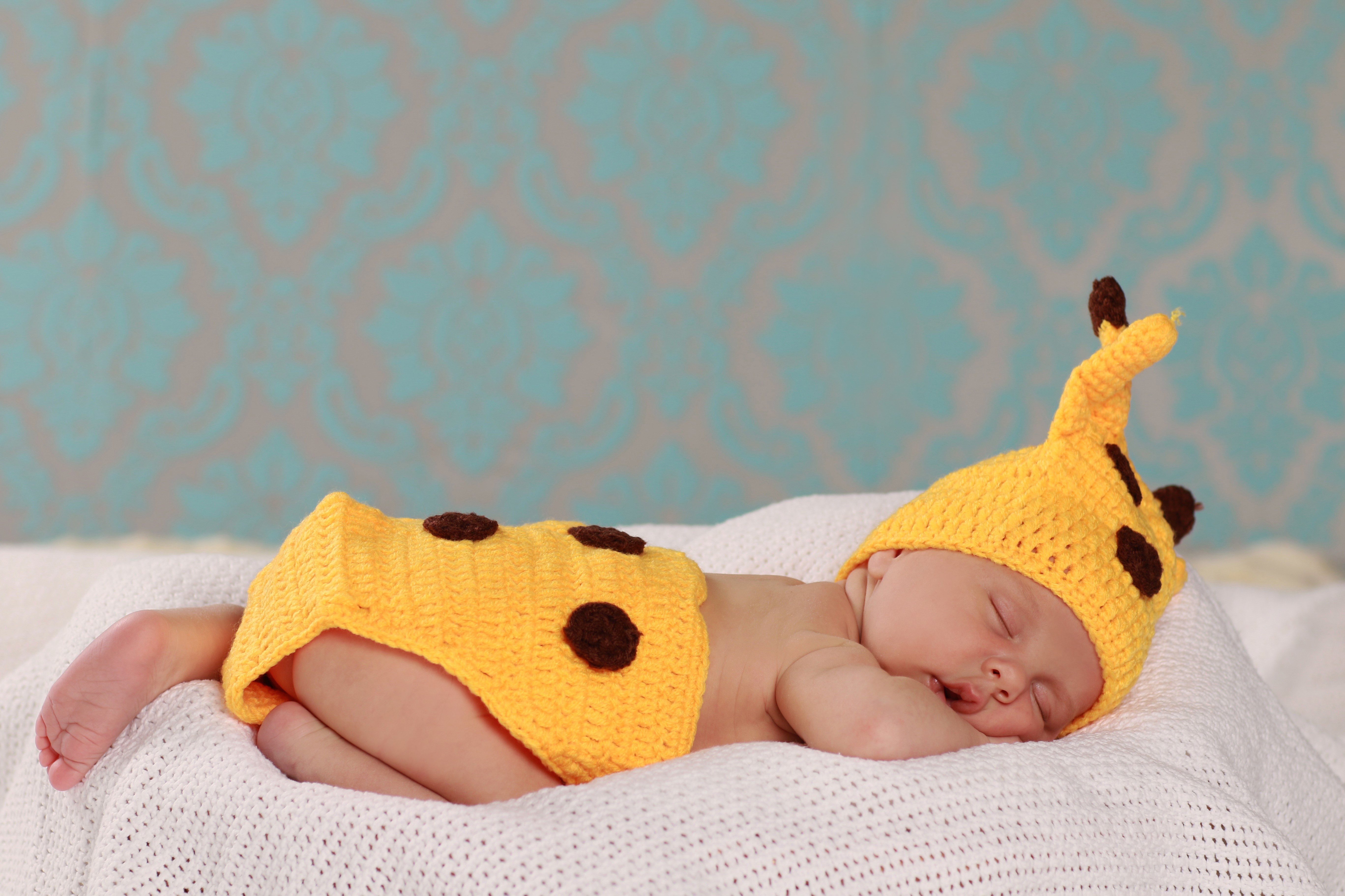 Baby in Giraffe Costume Sleeping HD Wallpaper