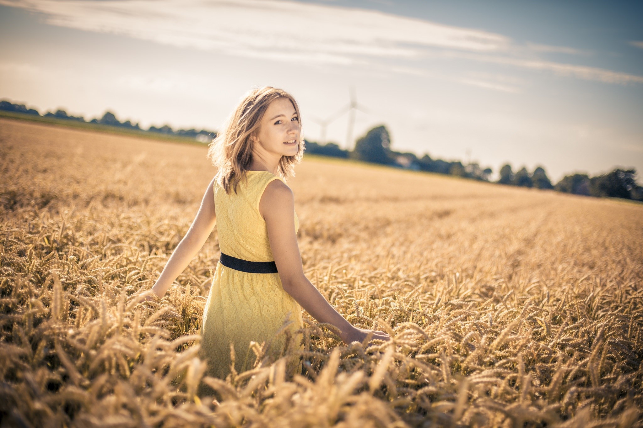 Girl in yellow dress in a wheat field HD Wallpaper