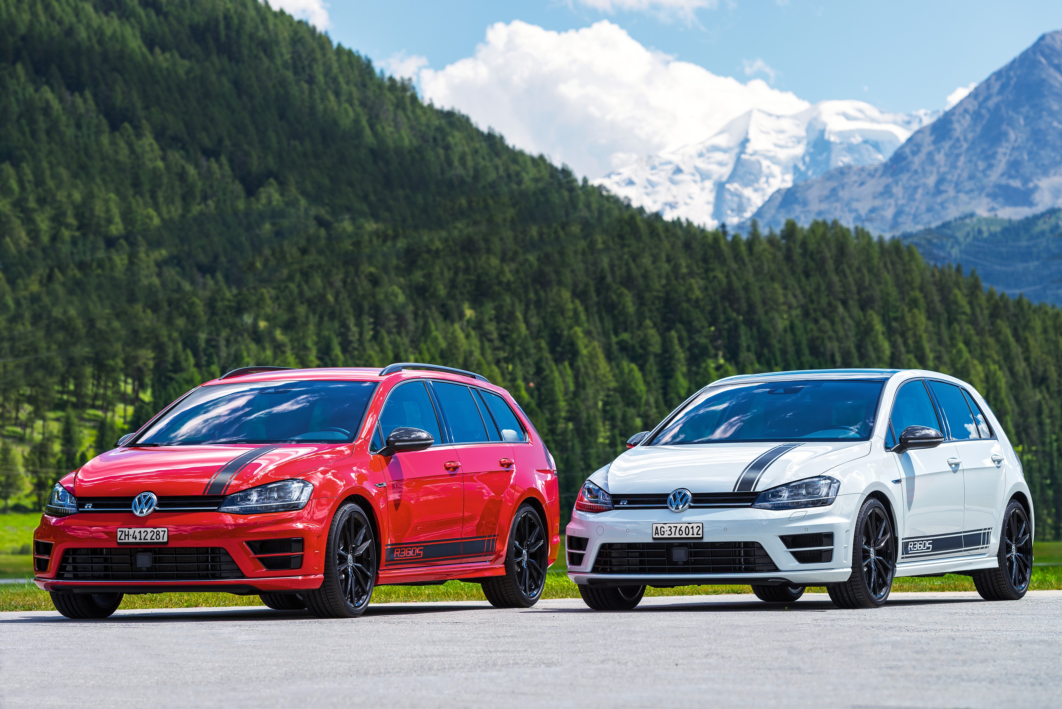 Two Volkswagen Golf R Estate cars in mountains HD Wallpaper