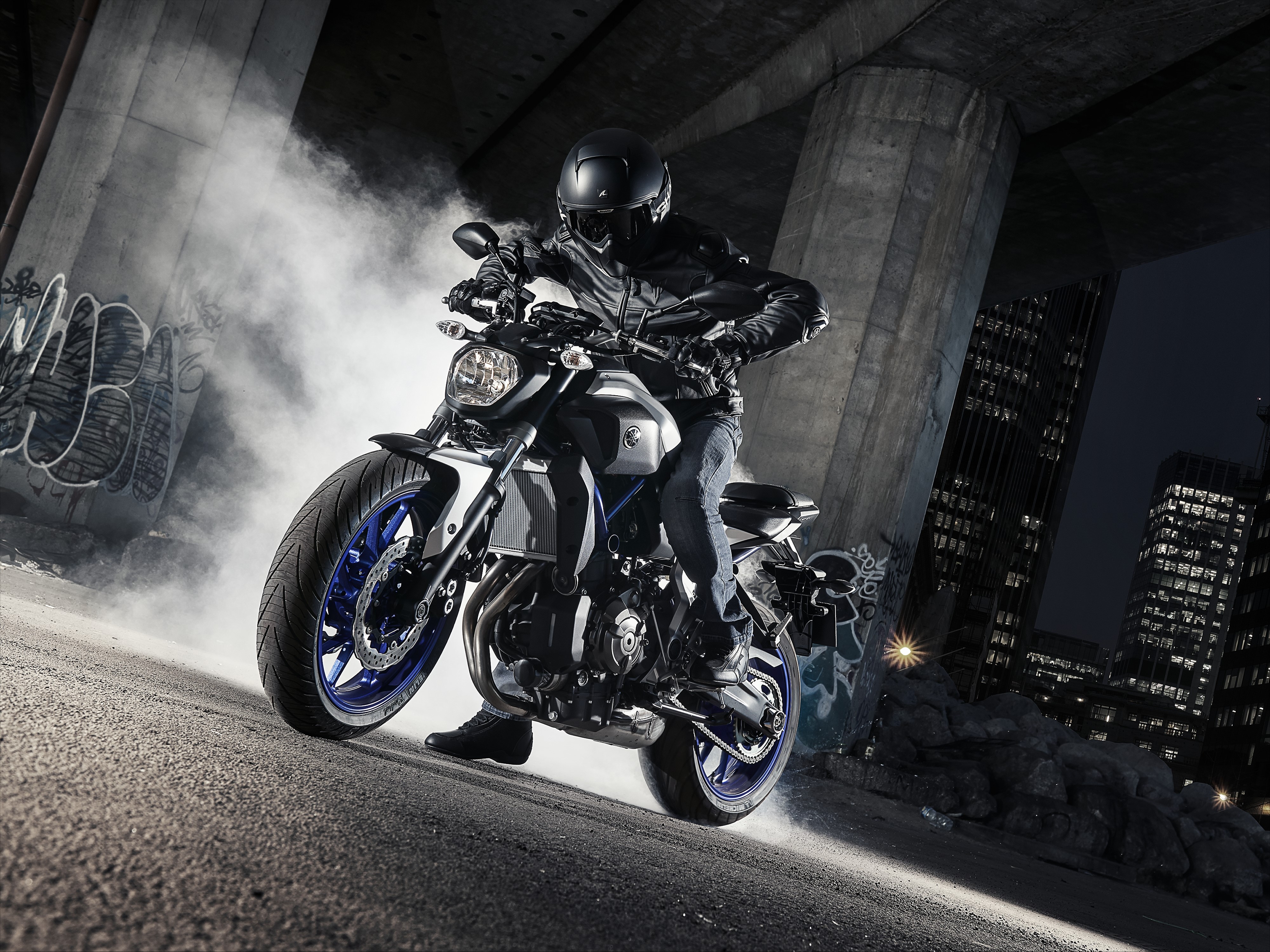 Motorcyclist on Yamaha MT-07 under bridge at night HD Wallpaper