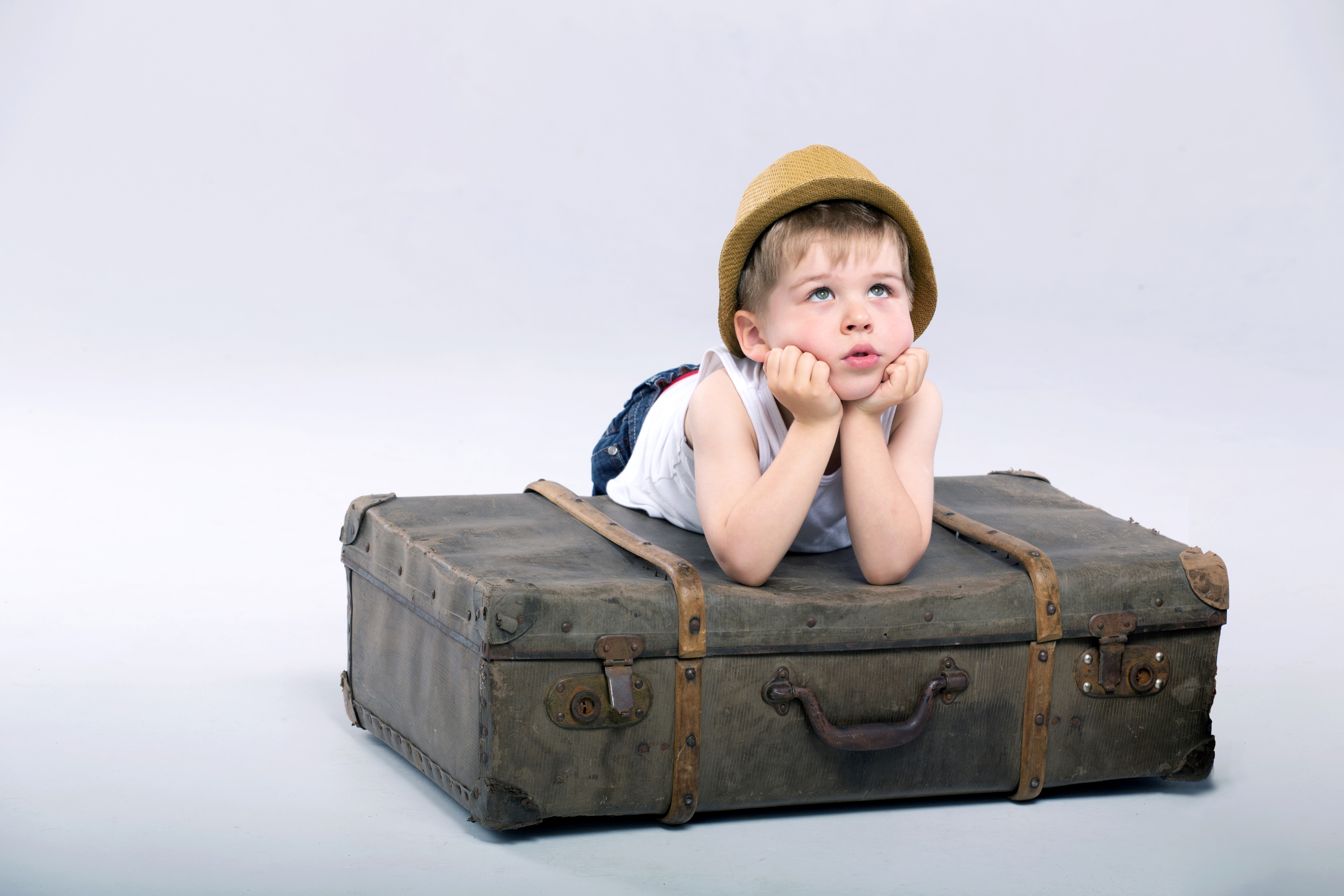 Boy in hat on suitcase HD Wallpaper
