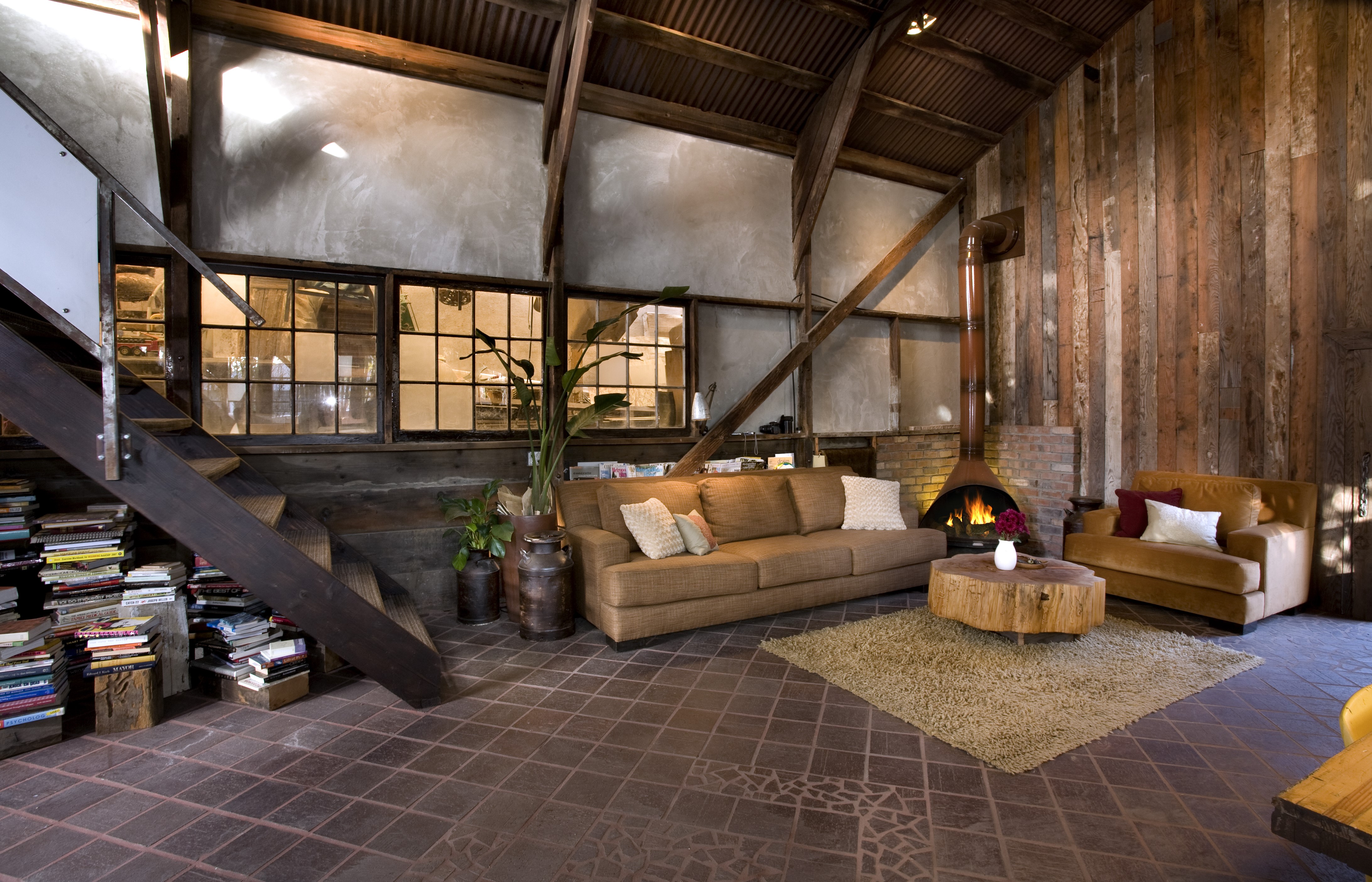 Living room with fireplace and stairs HD Wallpaper