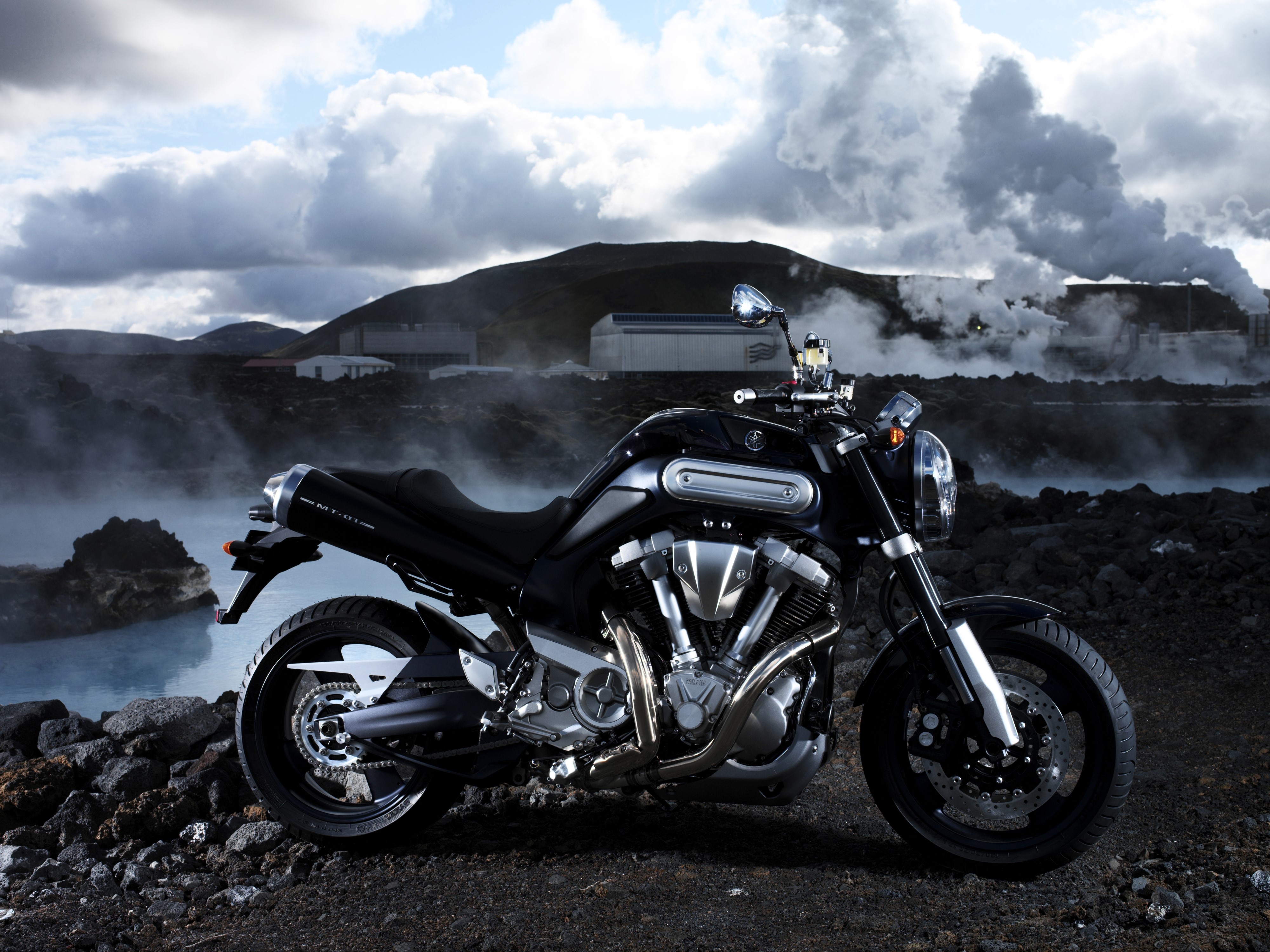 4K Yamaha MT-01 motorcycle in industrial landscape HD Wallpaper