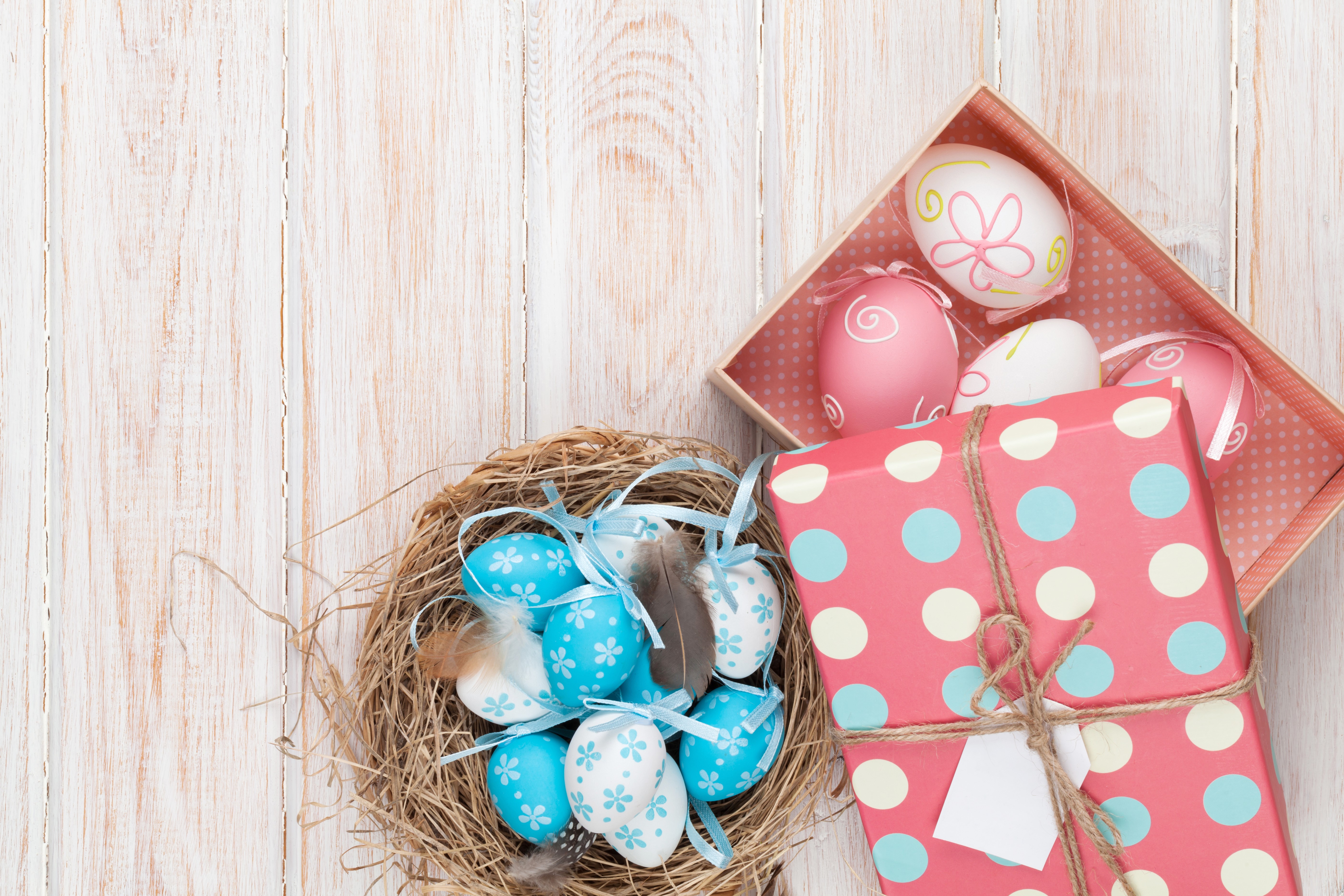 Easter eggs in a nest and a gift box HD Wallpaper