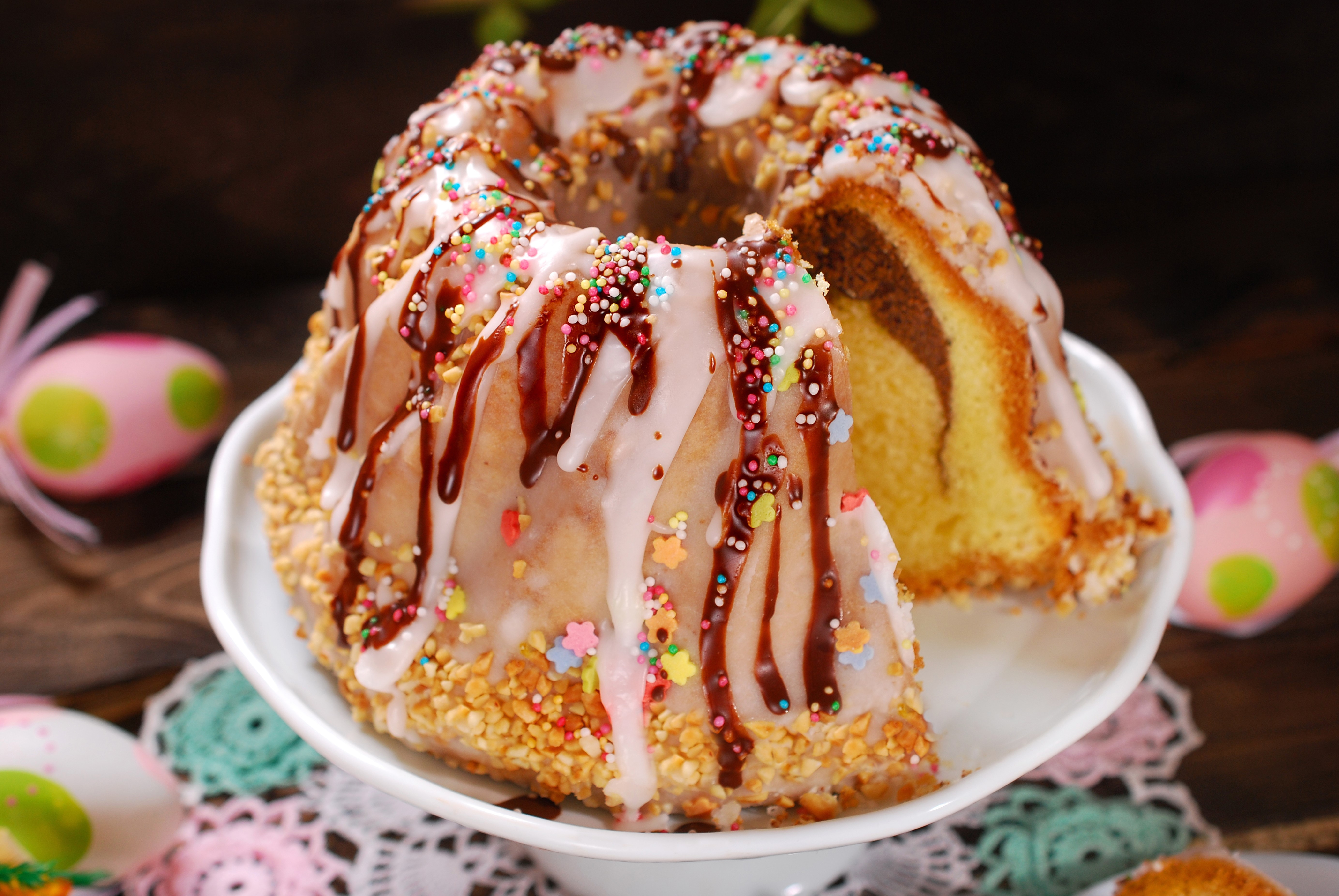 Easter Kulich cake with chocolate drizzle and sprinkles HD Wallpaper