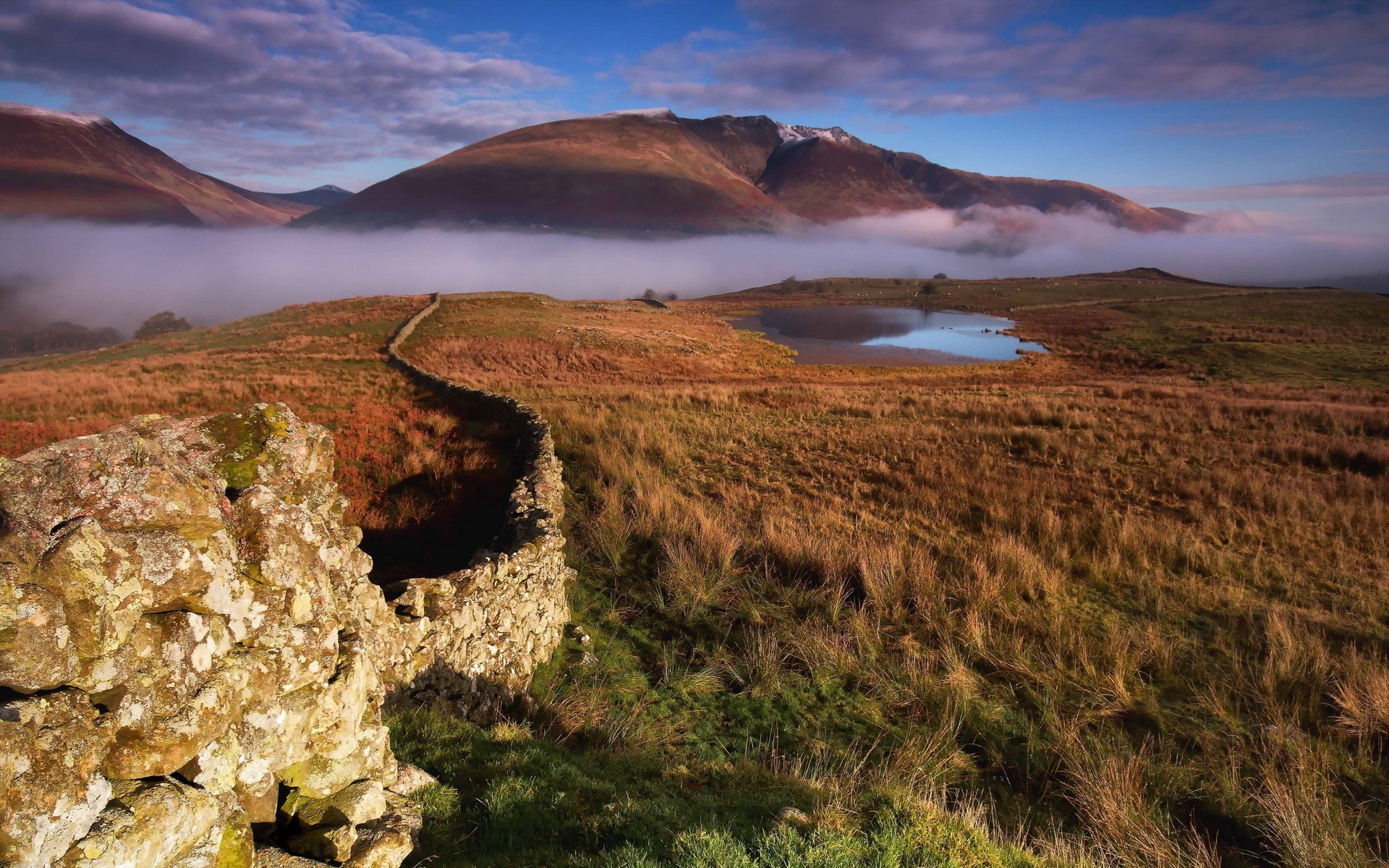 Misty Mountains and Stone Wall Landscape HD Wallpaper