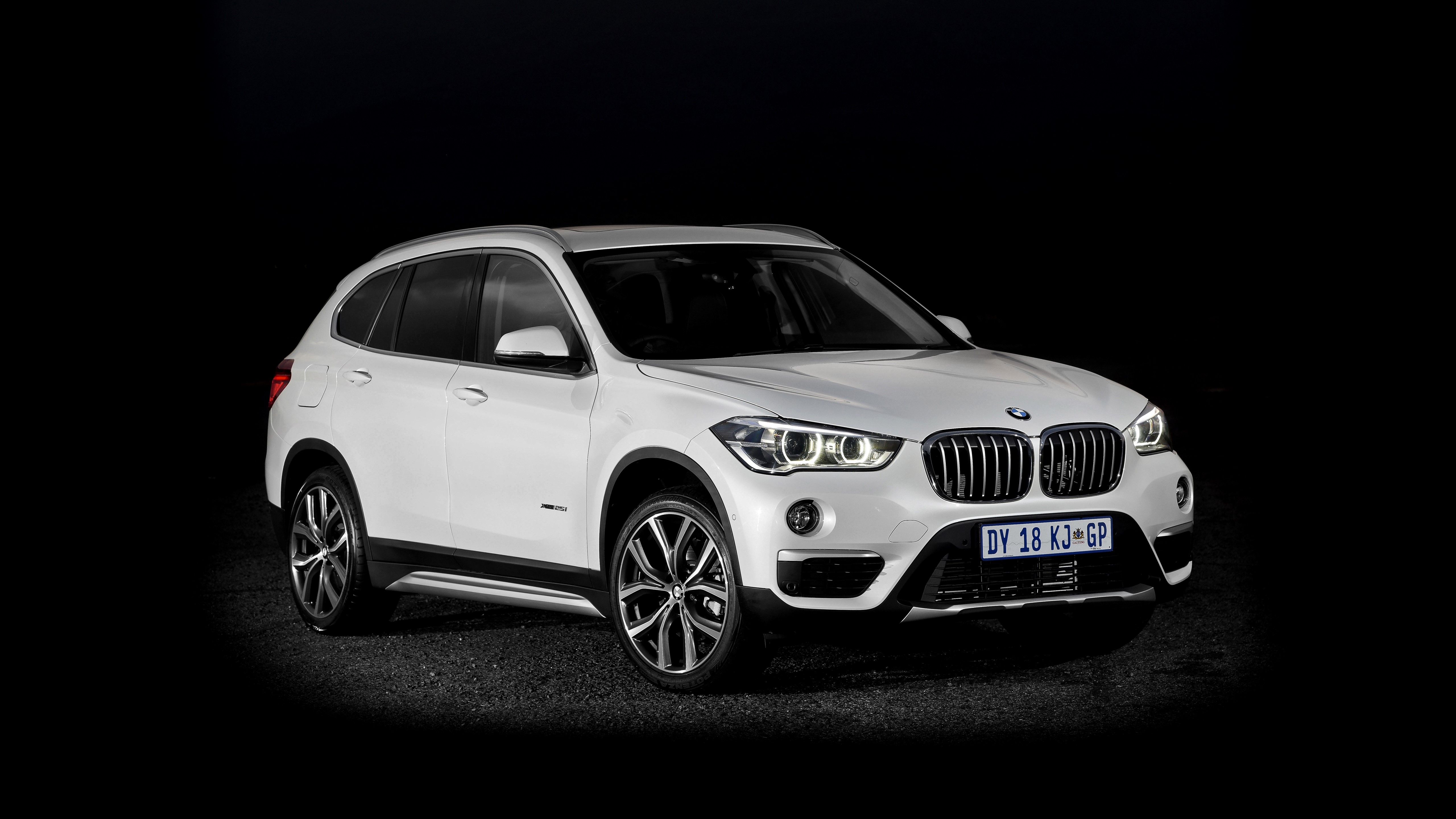 White BMW X1 xDrive F48 Crossover on Black Background HD Wallpaper