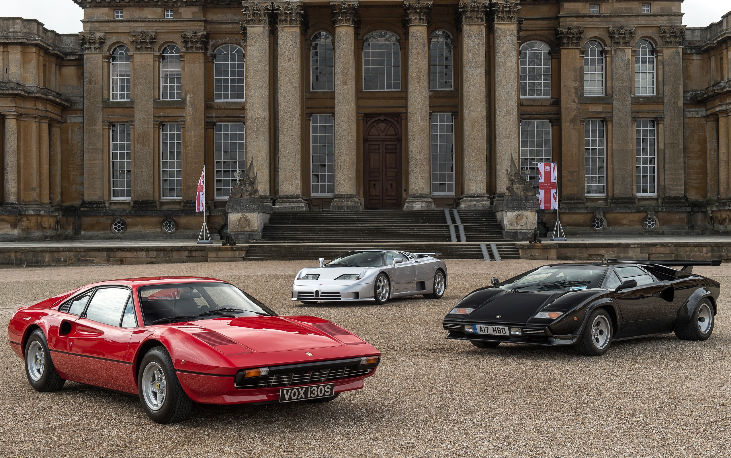 Three classic sports cars in front of a palace HD Wallpaper