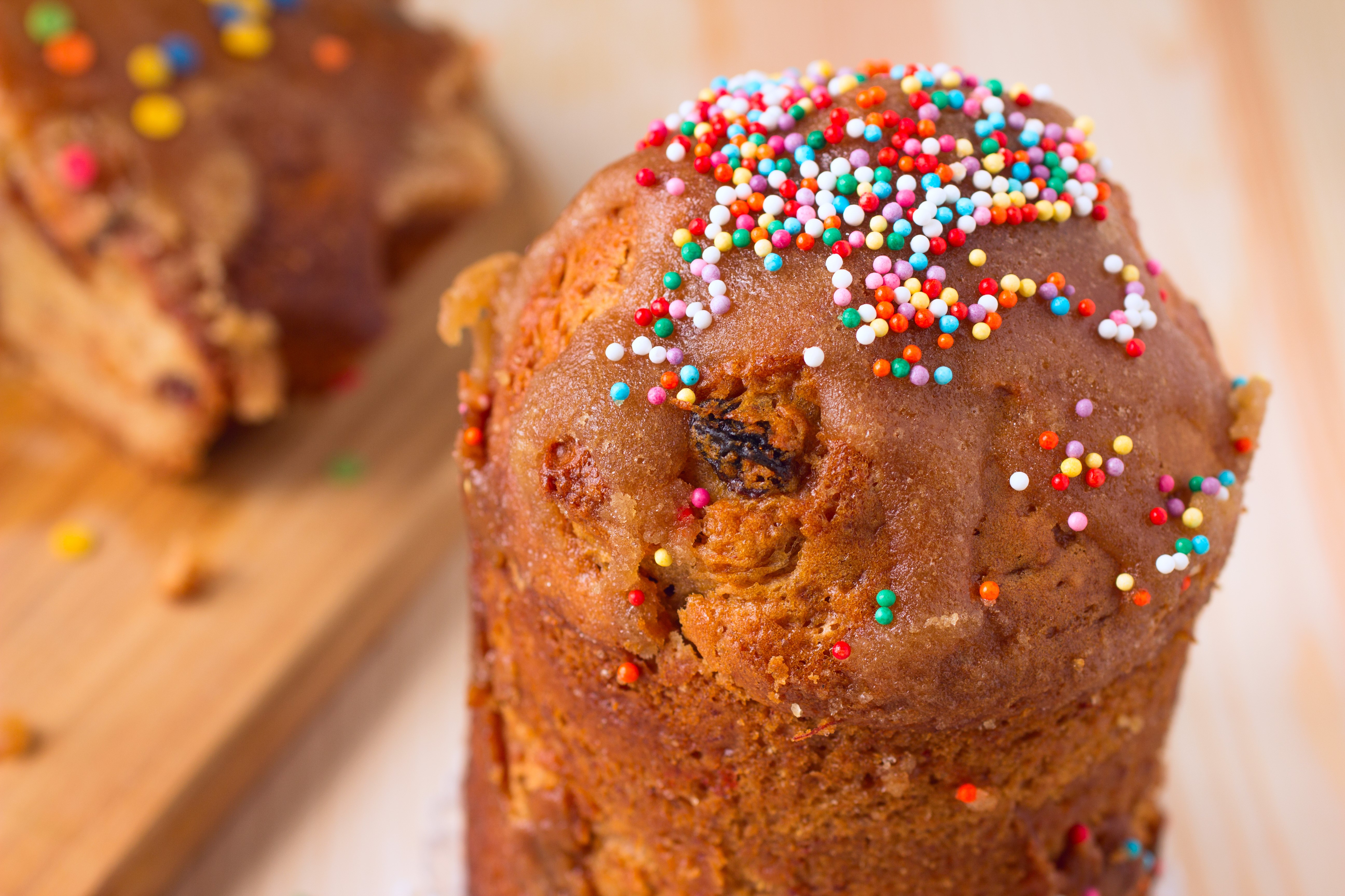 Easter Kulich pastry with colorful sprinkles HD Wallpaper