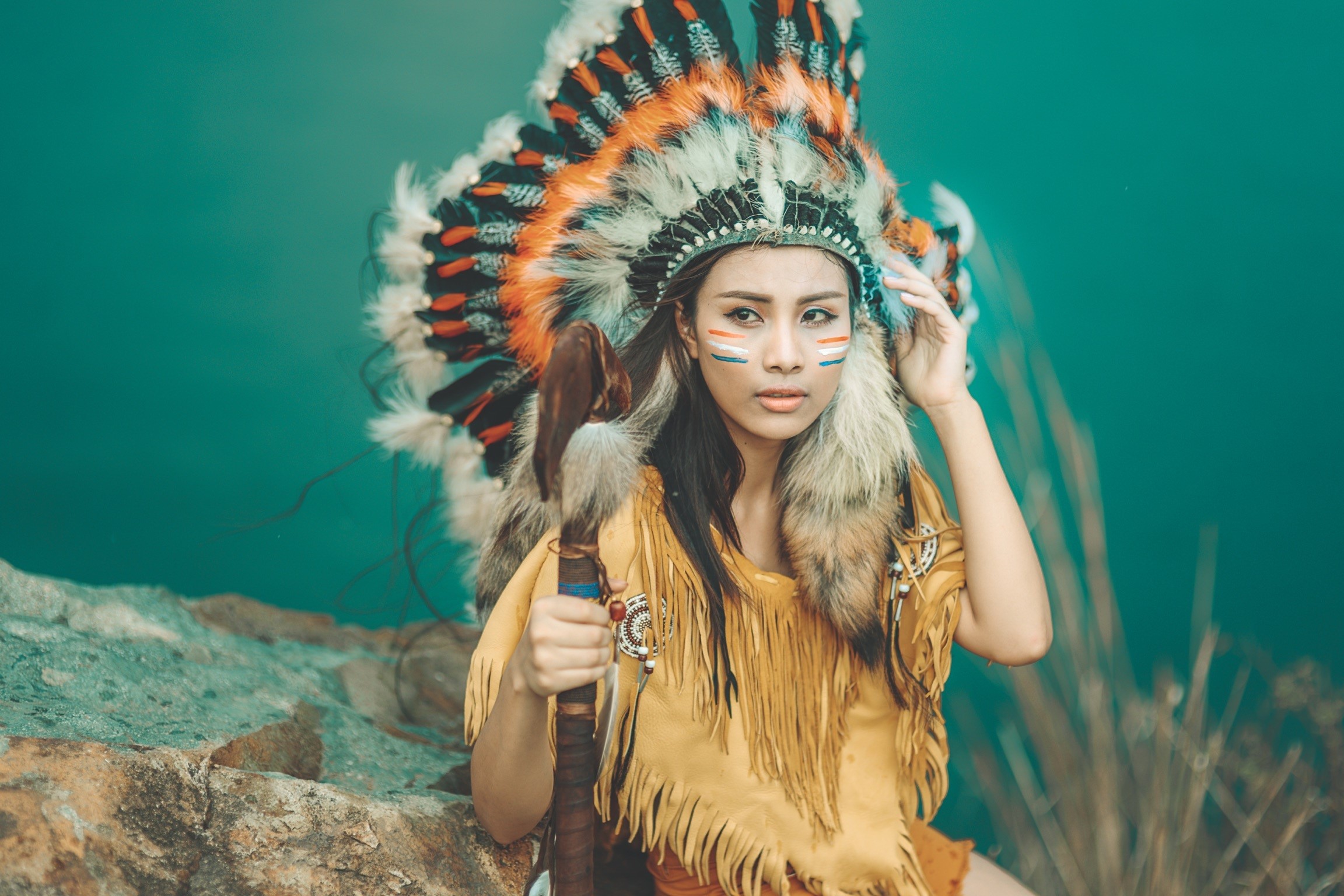 Woman in Native American Headdress Holding Staff HD Wallpaper