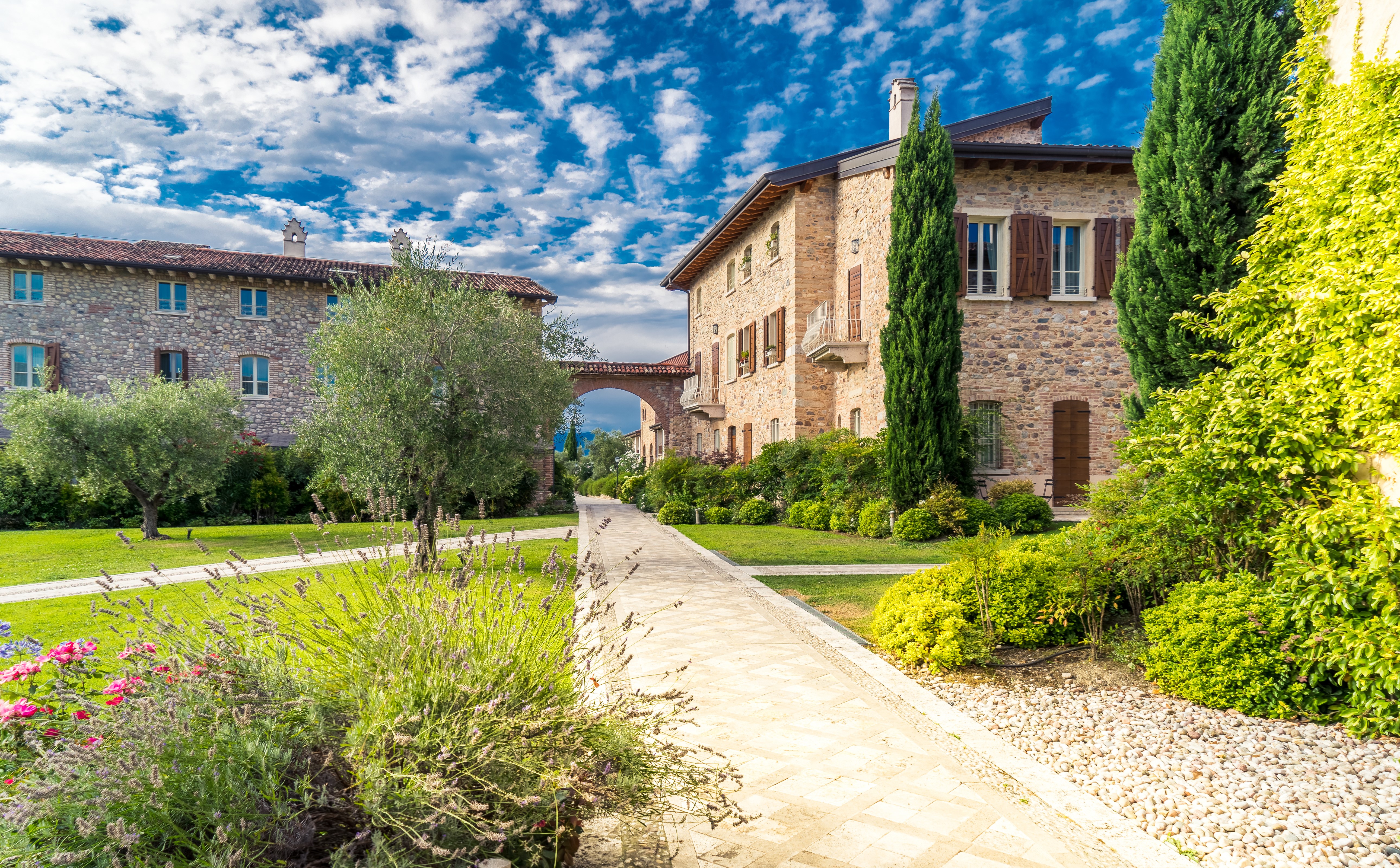 Kloster San Vigilio, Italy, with stone buildings and gardens HD Wallpaper