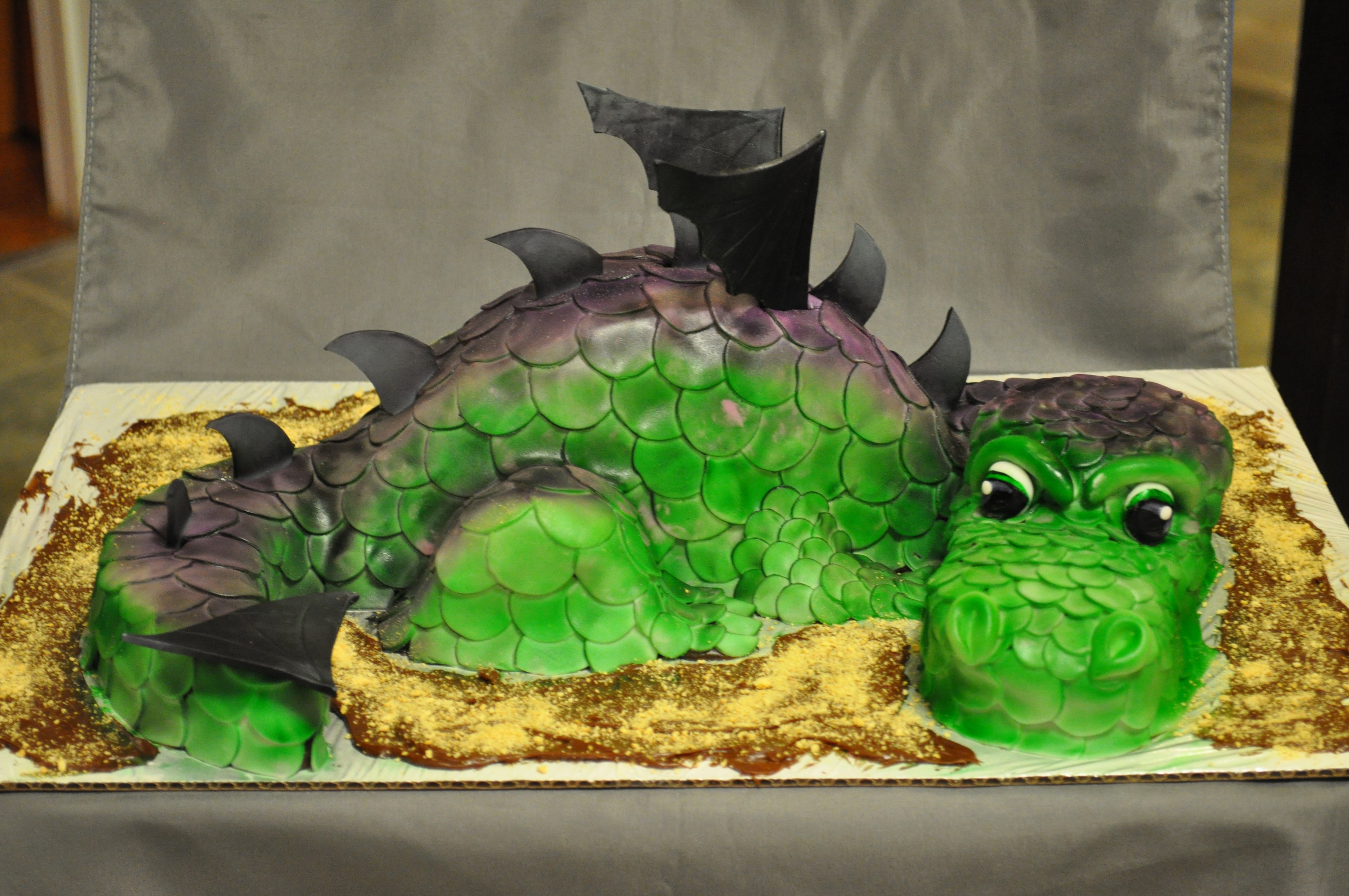 Dragon cake with green and purple scales HD Wallpaper