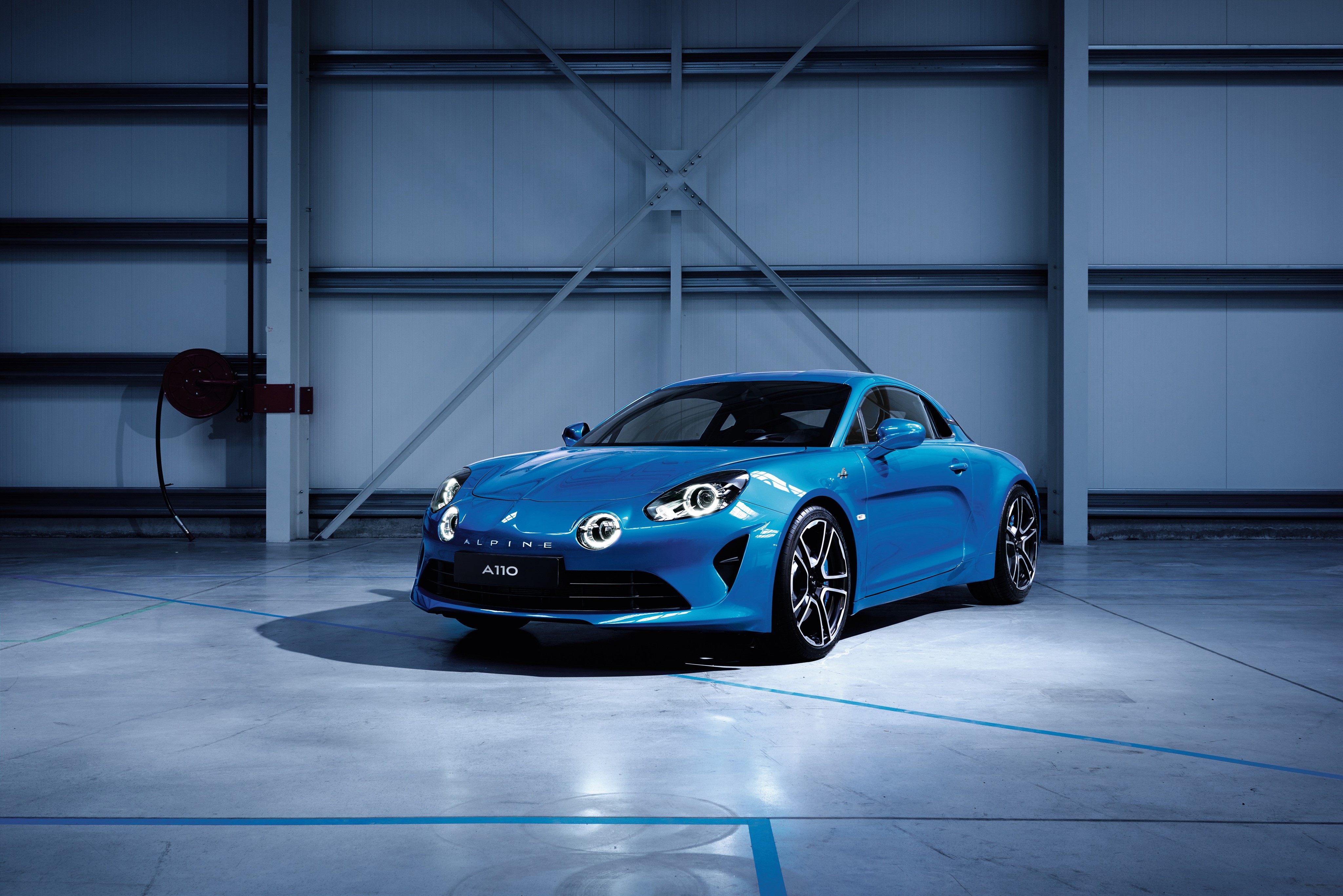 Blue 2017 Alpine A110 Premiere Edition in a Hangar HD Wallpaper