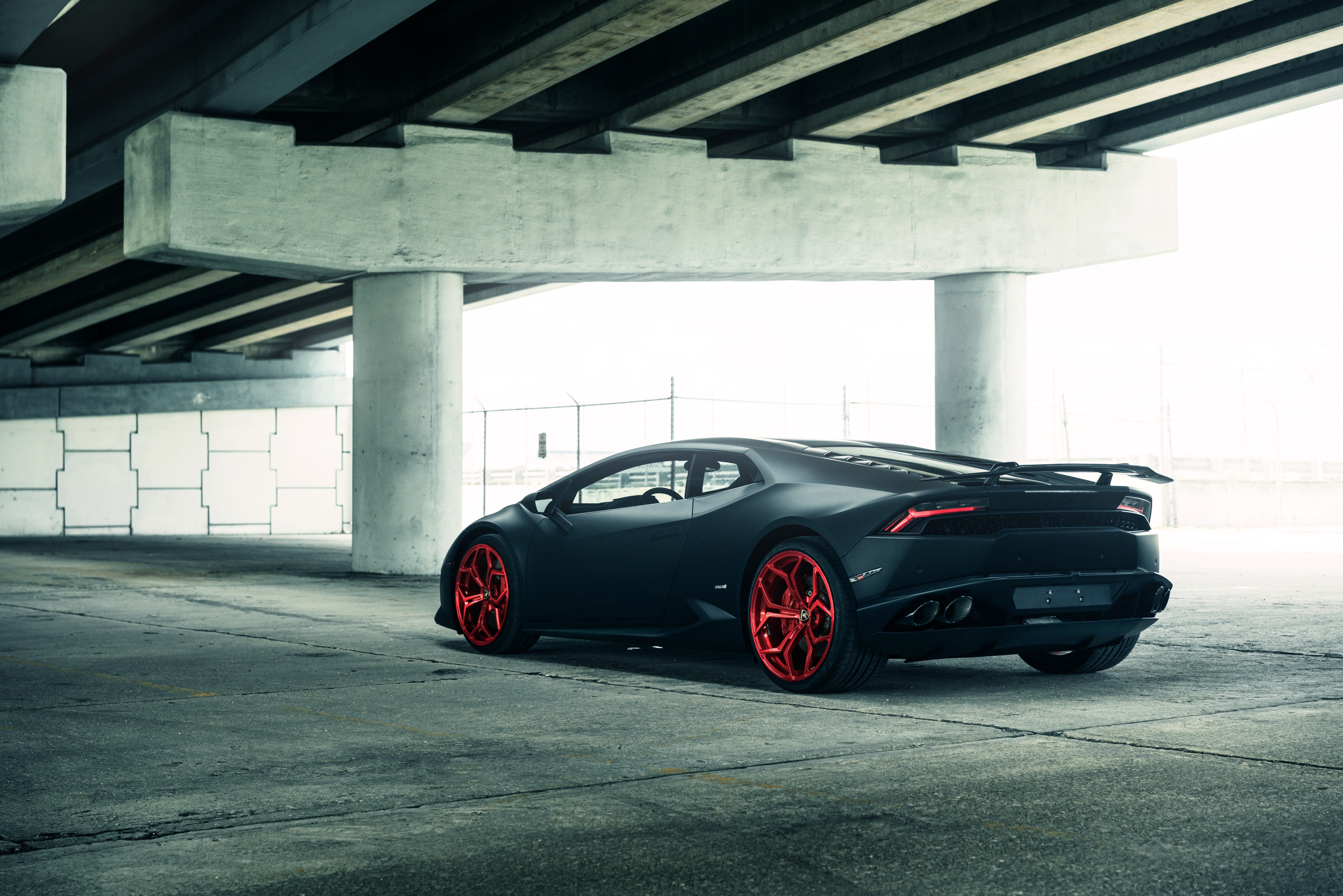 Matte Black Lamborghini Huracan with Red Wheels HD Wallpaper