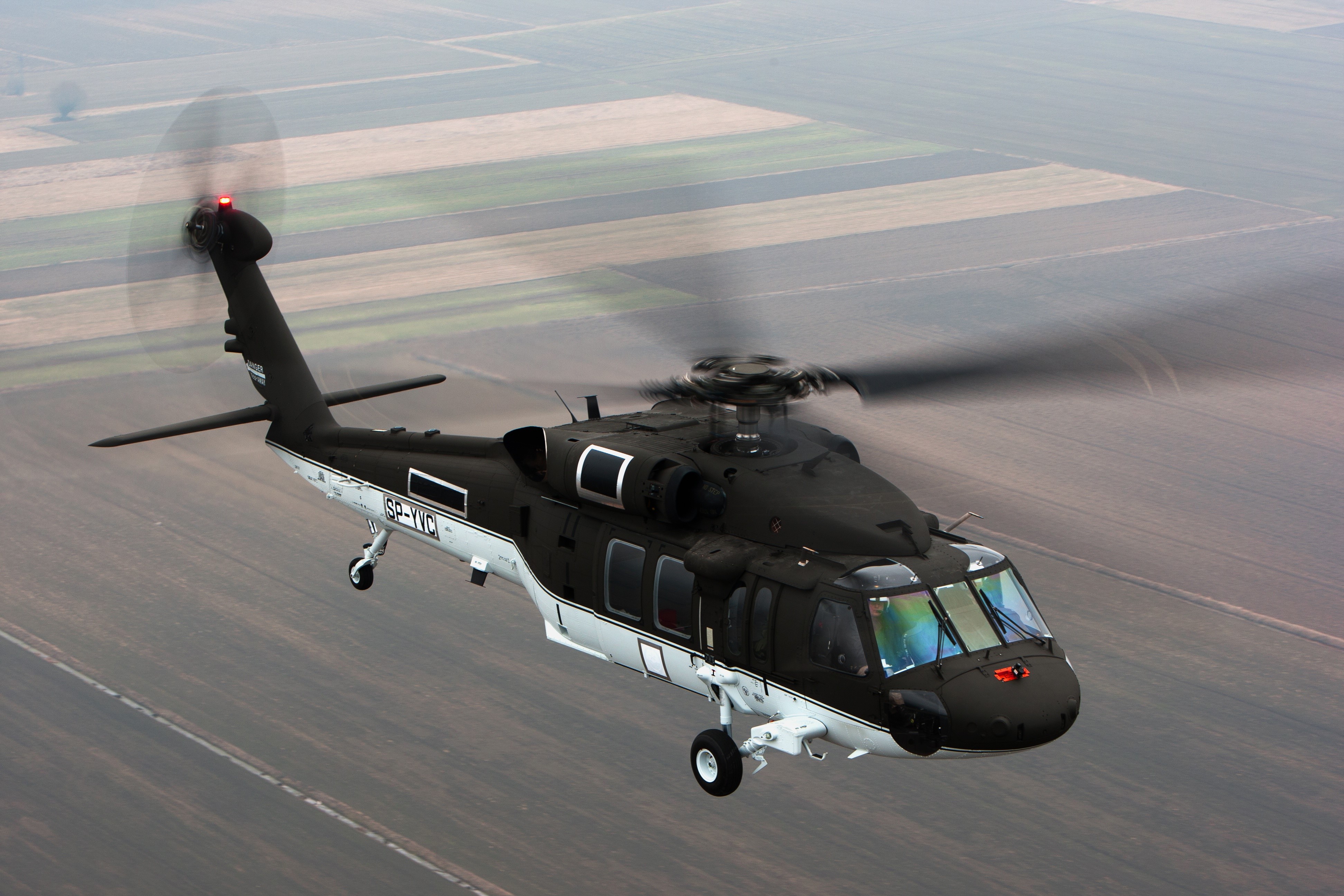 4K S-70i Black Hawk Helicopter in Flight HD Wallpaper