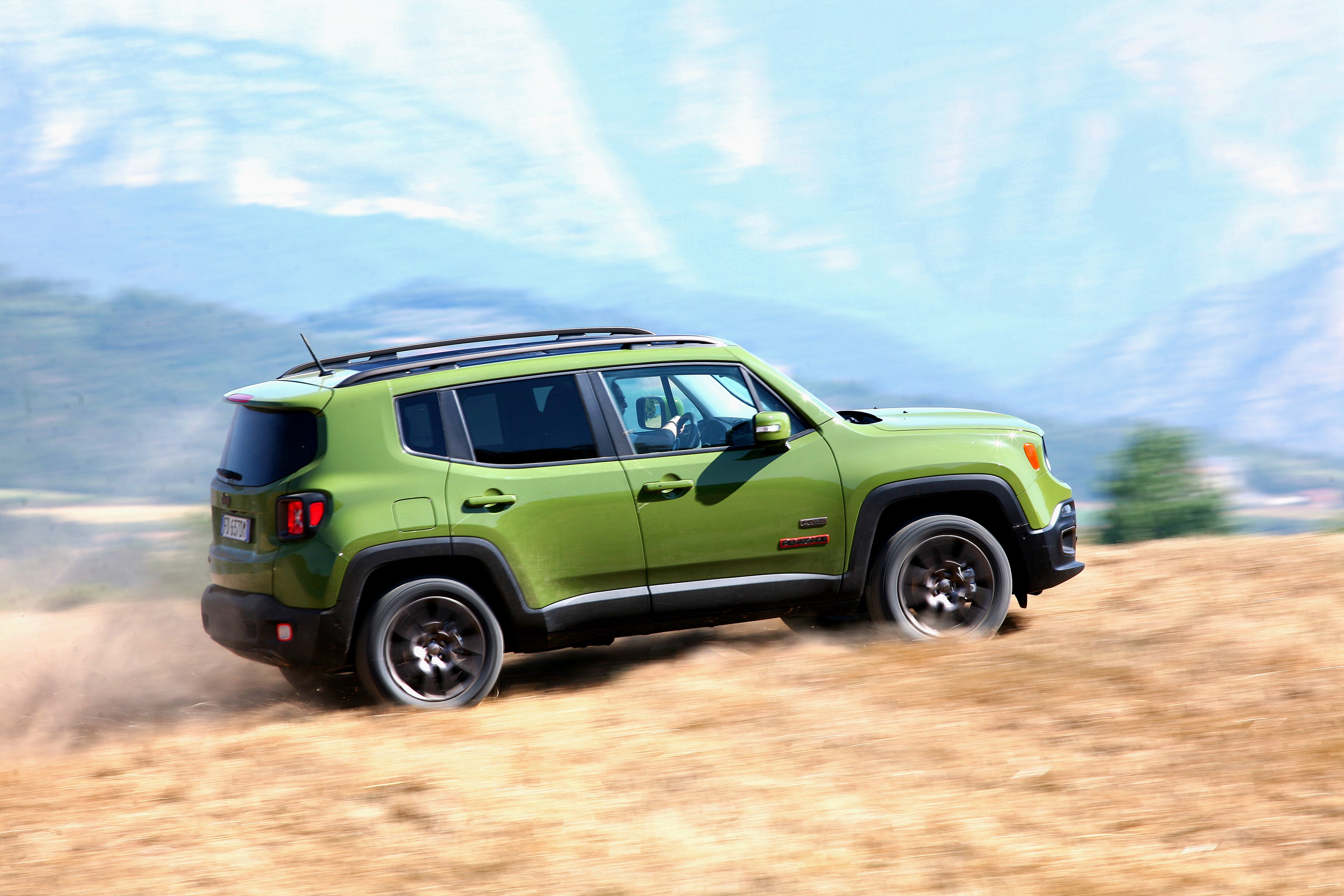 Green Jeep Renegade 75th Anniversary driving off-road HD Wallpaper