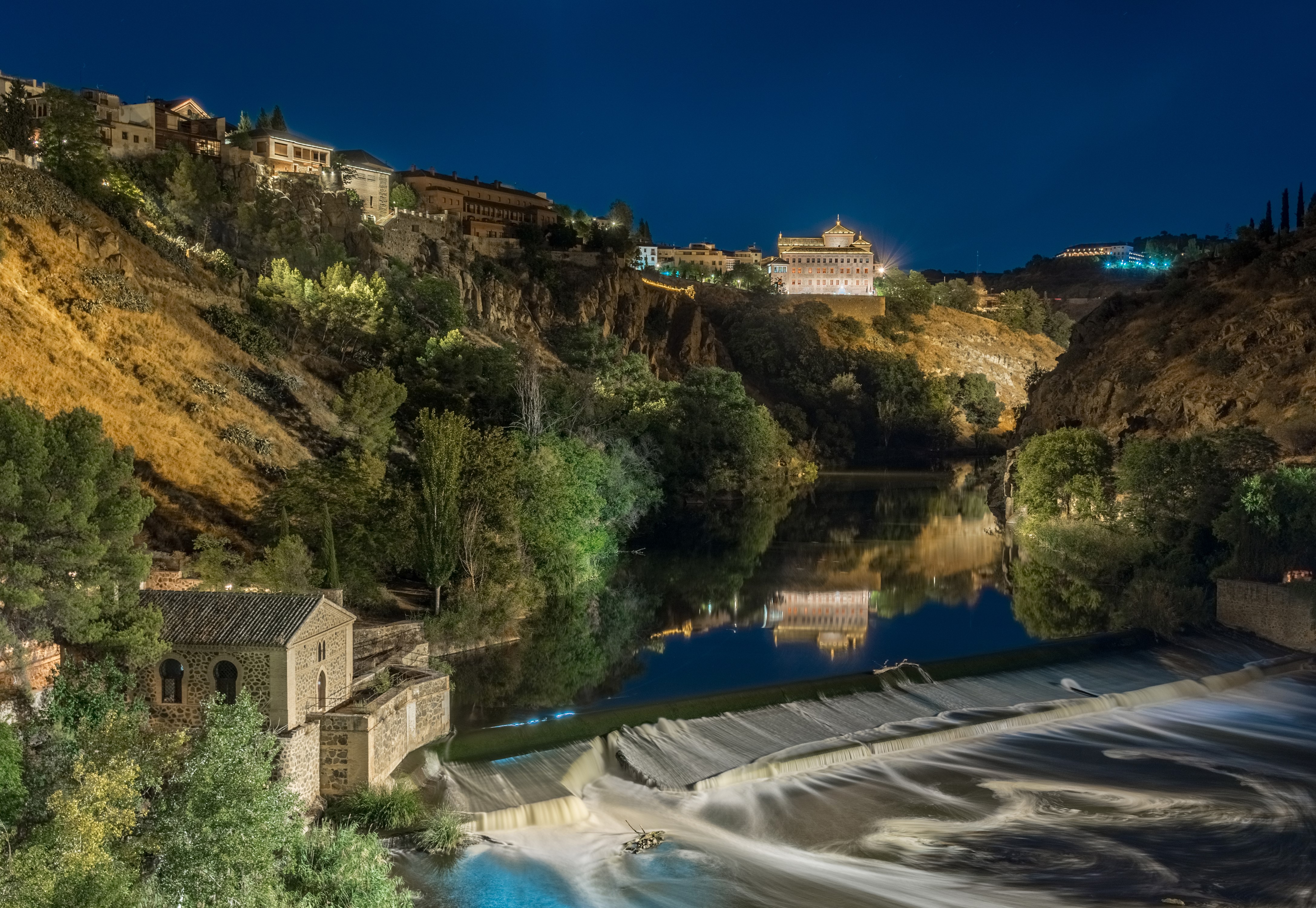 Toledo, Spain at night with river and waterfall HD Wallpaper