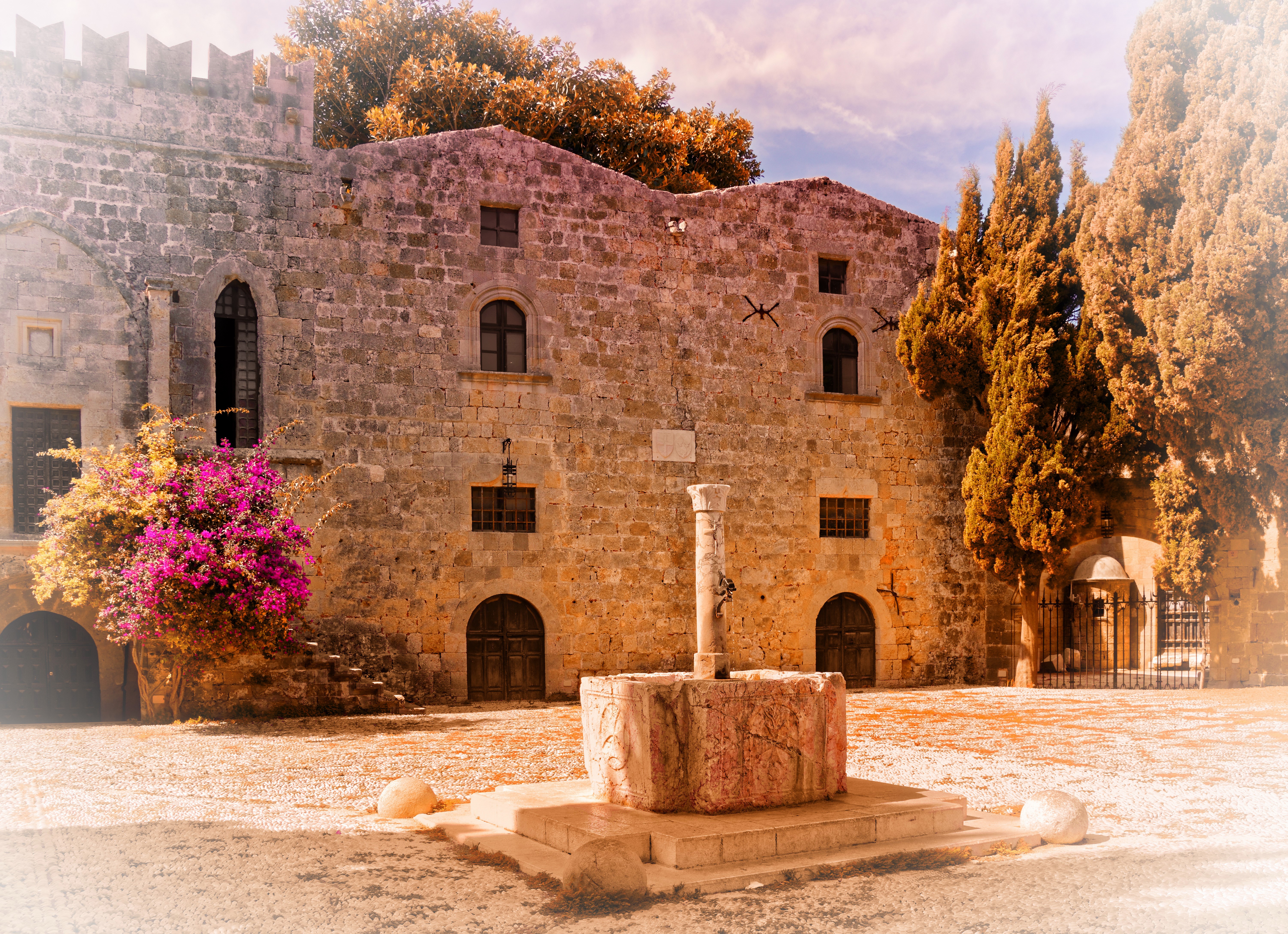 Stone building with well in Rhodes, Greece HD Wallpaper
