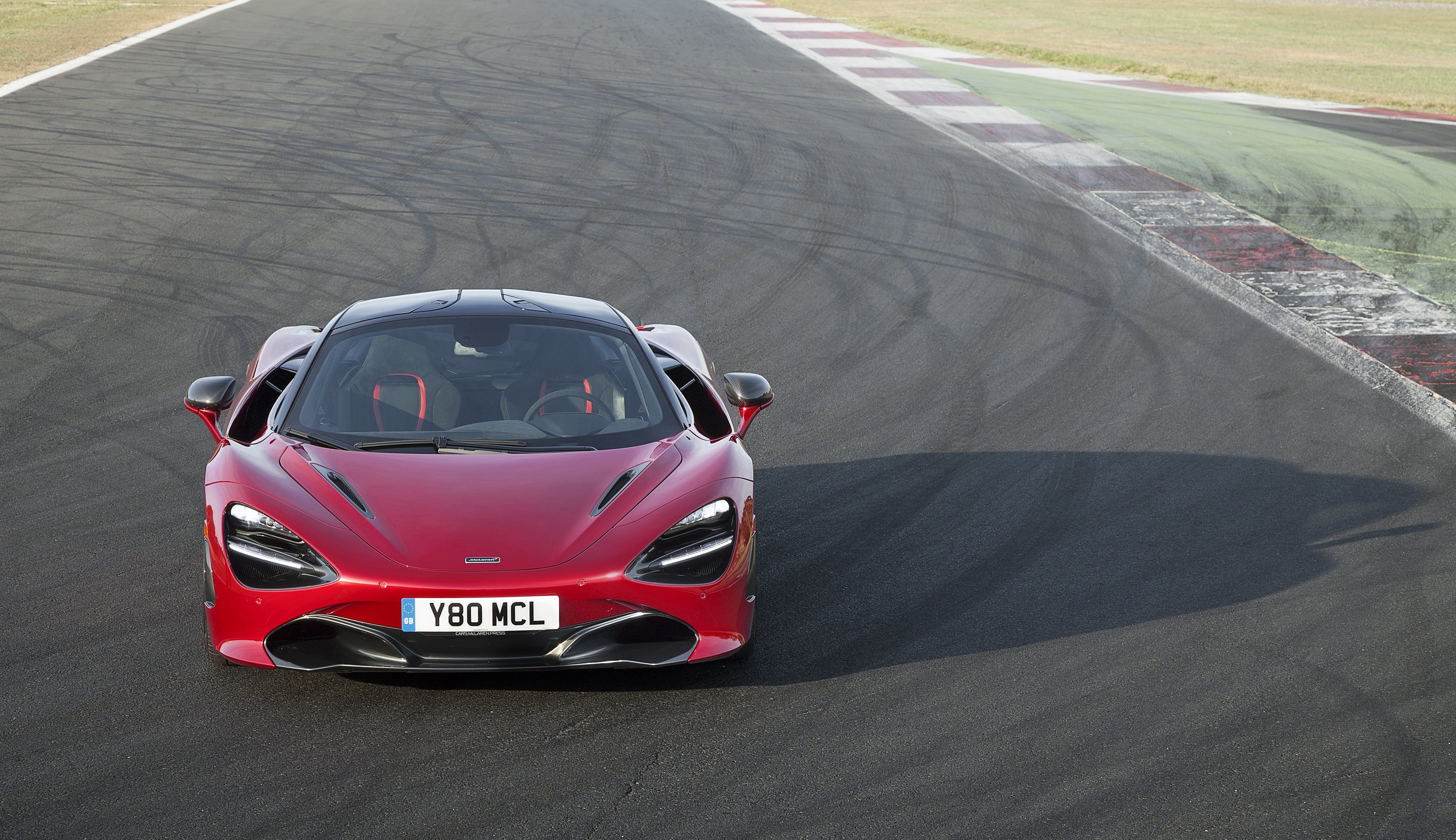 McLaren 720S Coupe on a race track HD Wallpaper