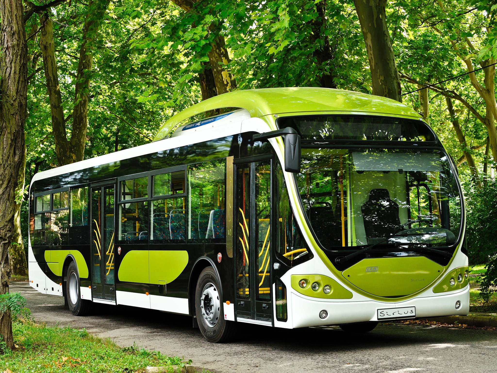 2010-13 NABI Sirius bus in a green forest HD Wallpaper
