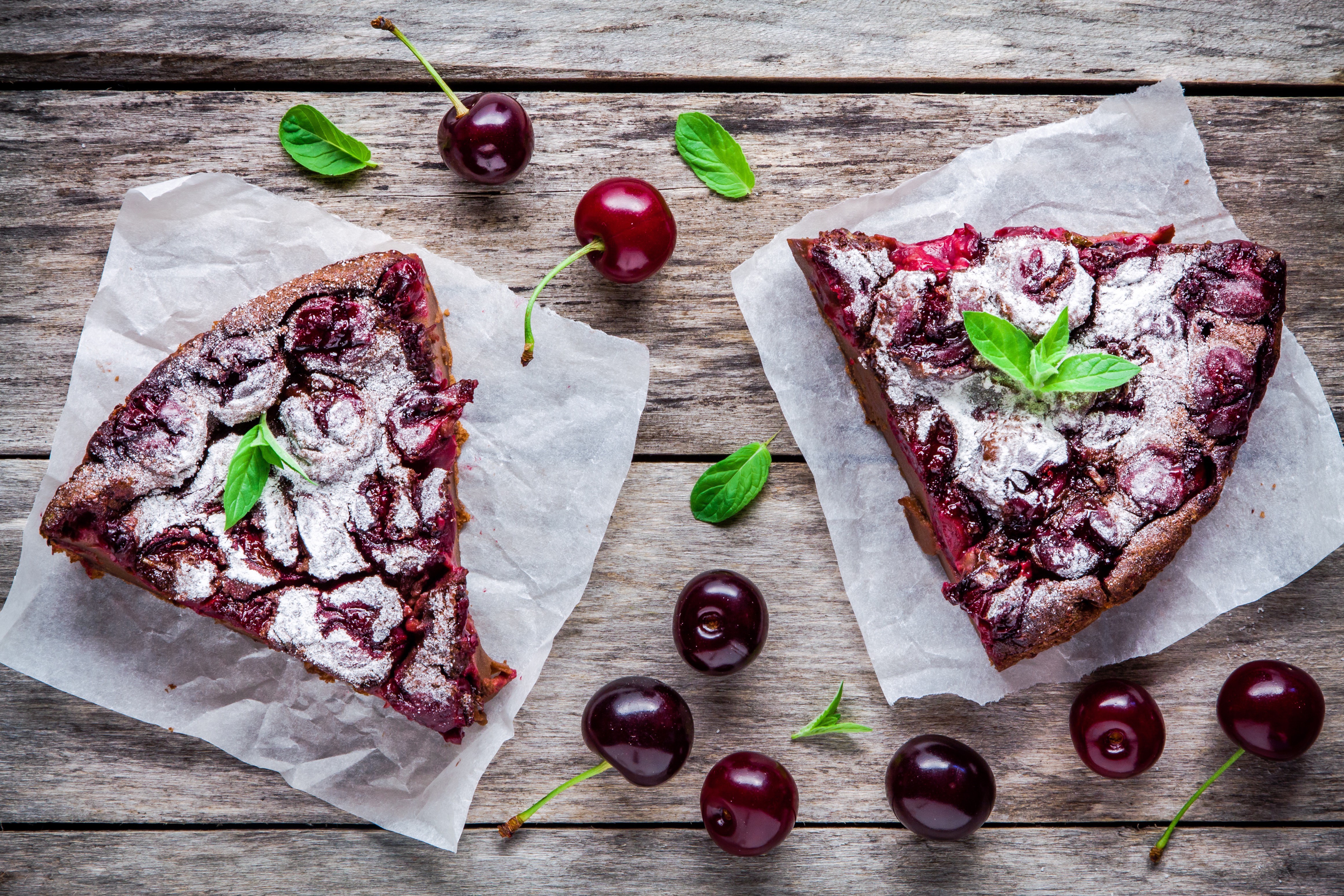 Cherry pie slices on wooden planks HD Wallpaper