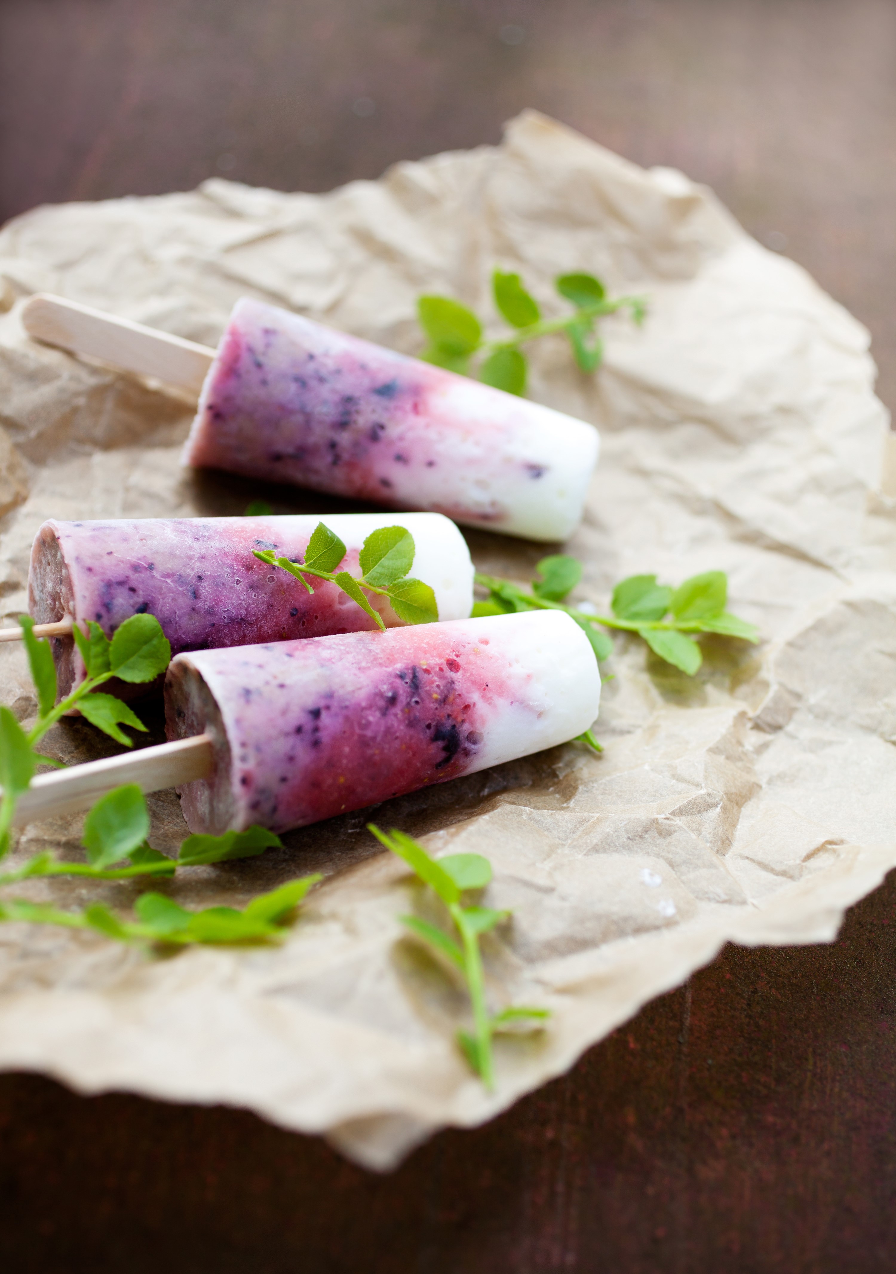 Three berry and yogurt popsicles on crumpled brown paper HD Phone Wallpaper
