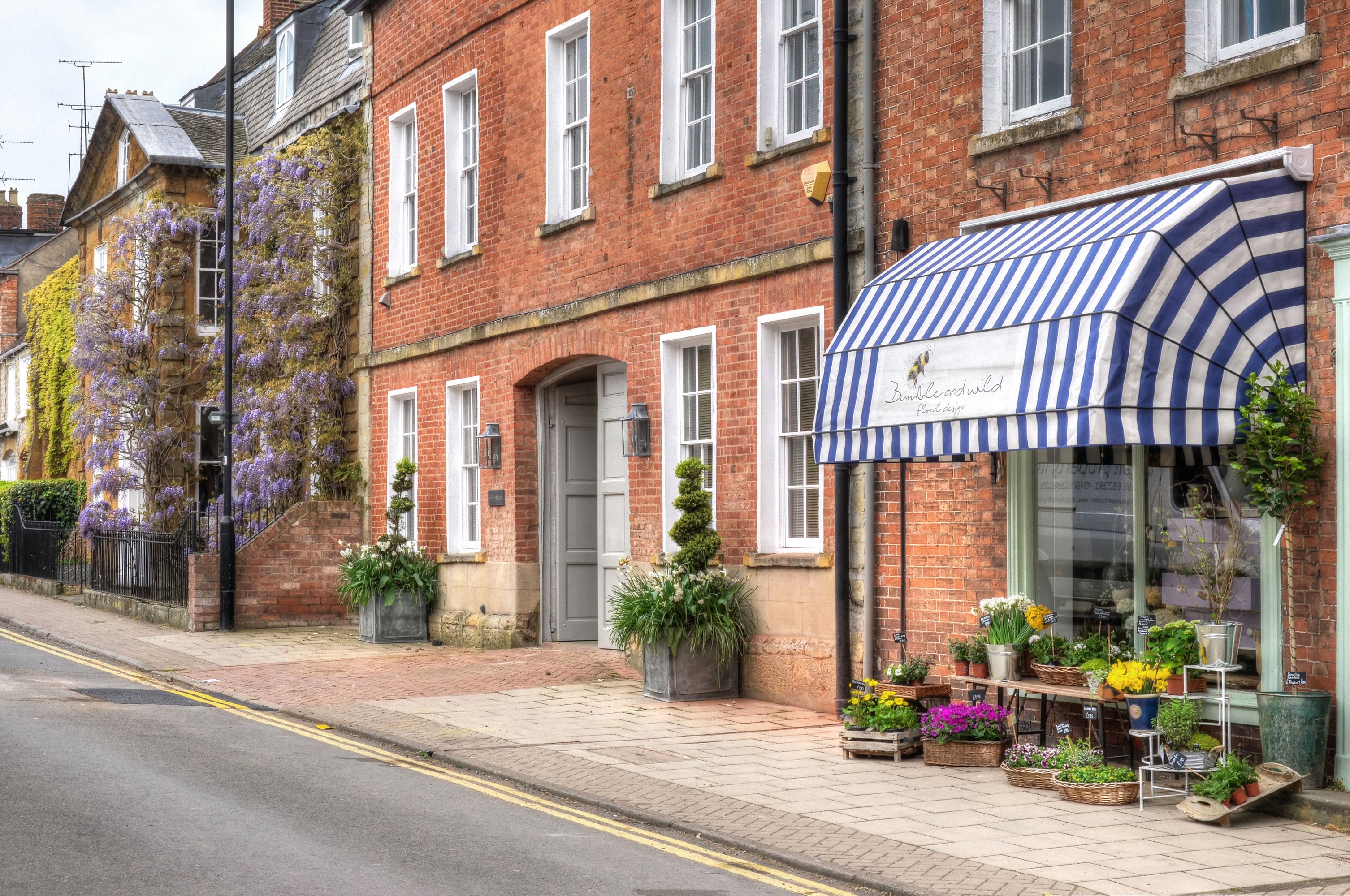 Flower shop on a street in Shipston on Stour, England HD Wallpaper