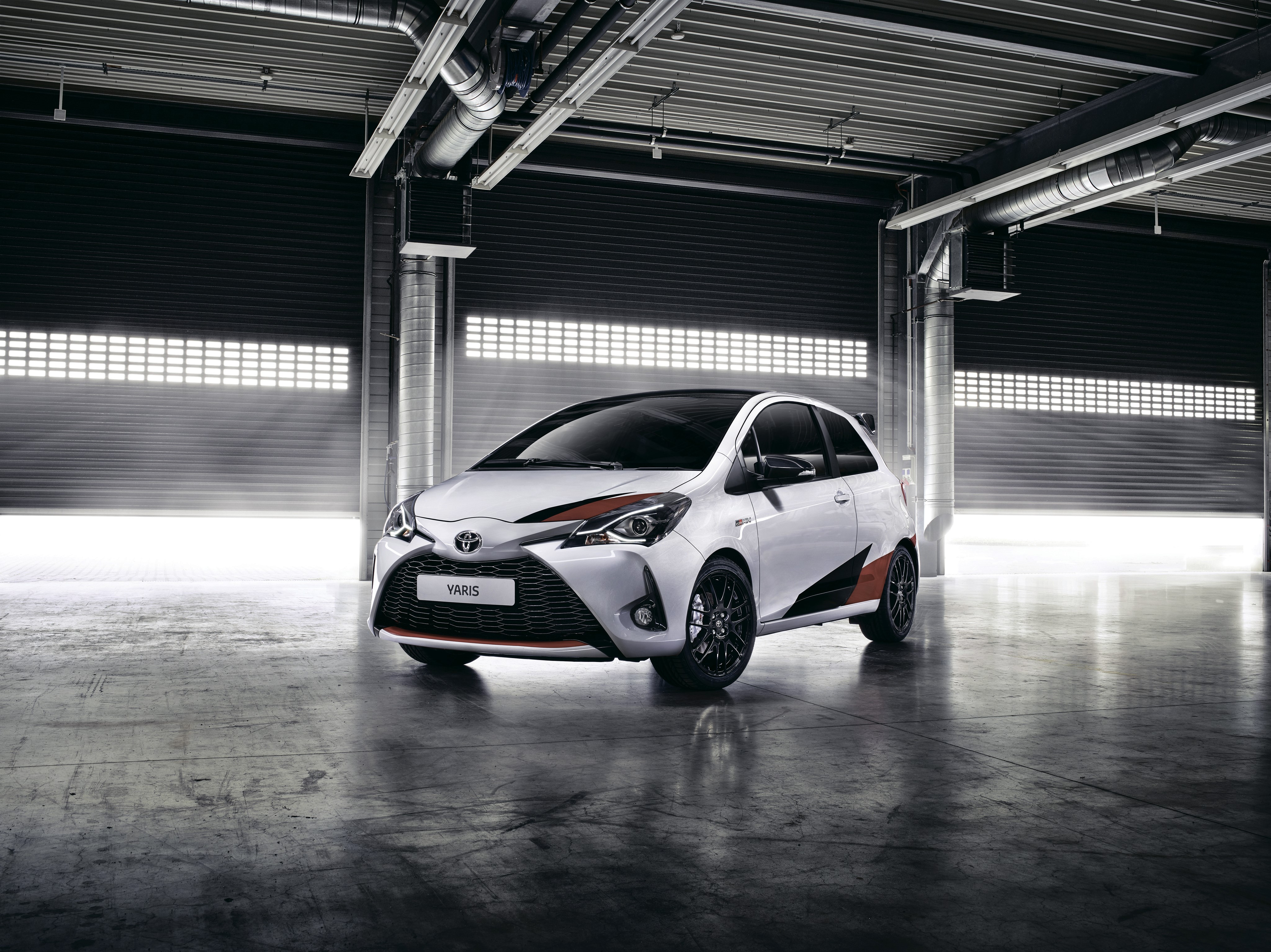 White 2017 Toyota Yaris GRMN in garage HD Wallpaper