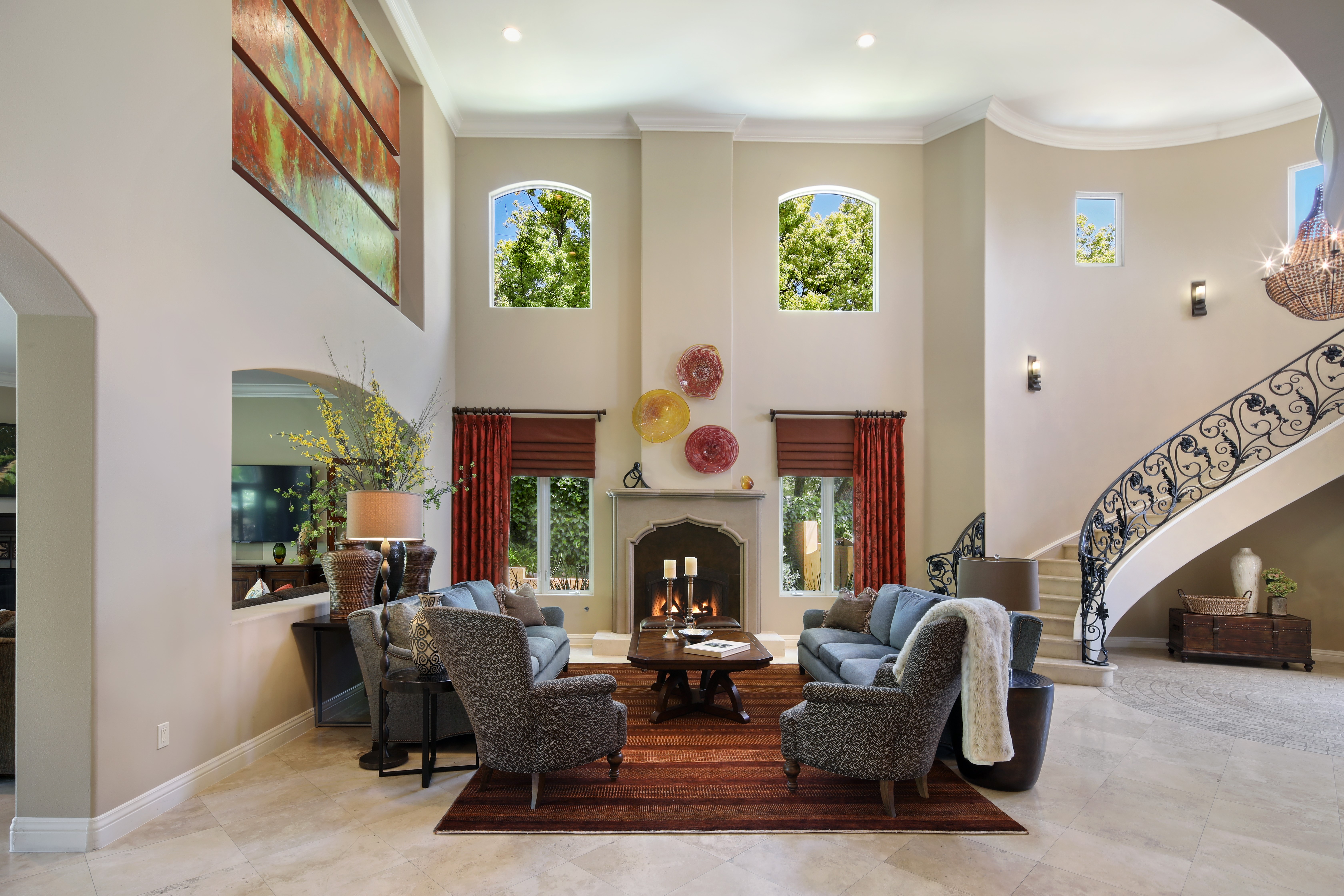 Living room with sofas, armchairs, and fireplace HD Wallpaper