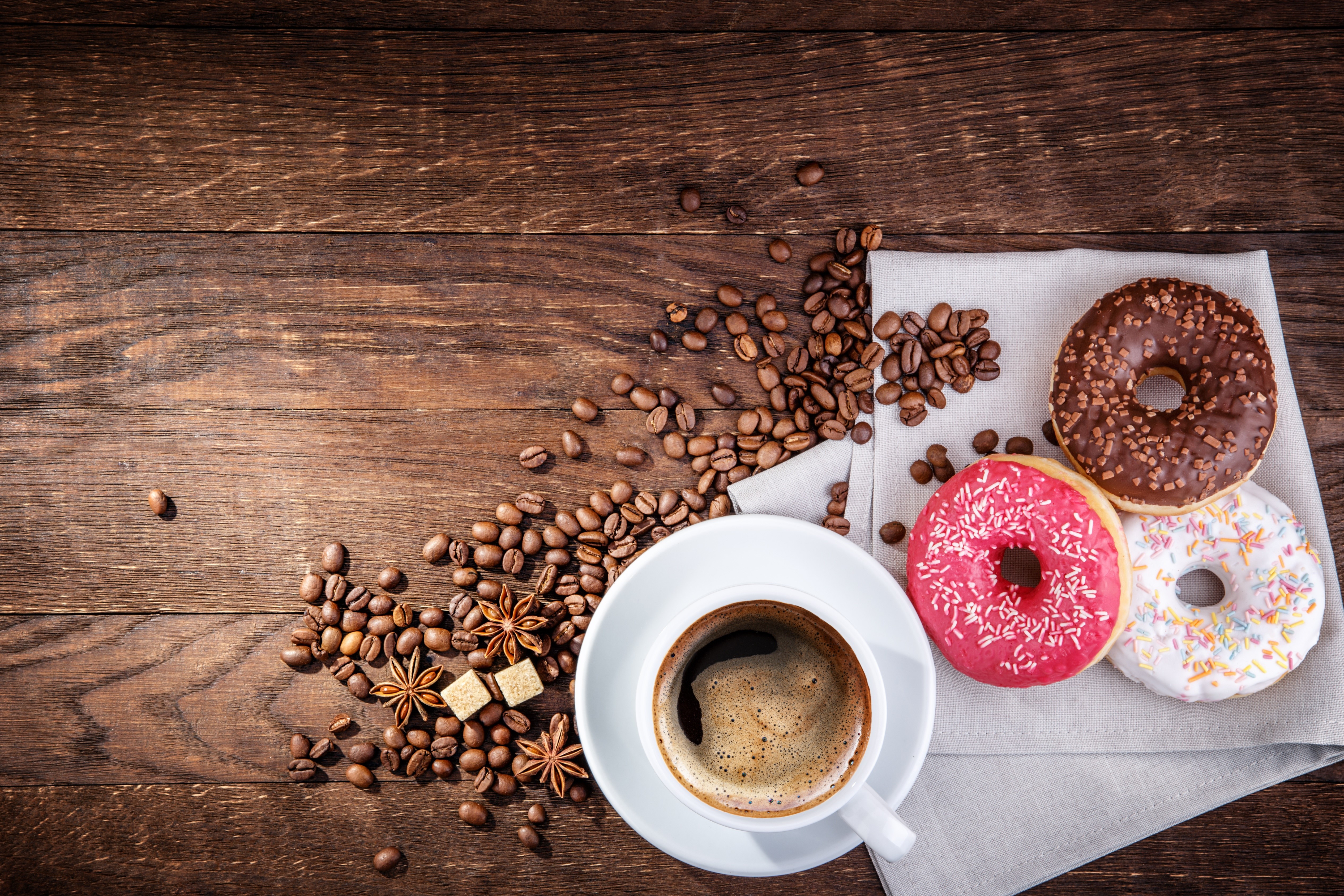 Coffee cup with donuts and coffee beans HD Wallpaper
