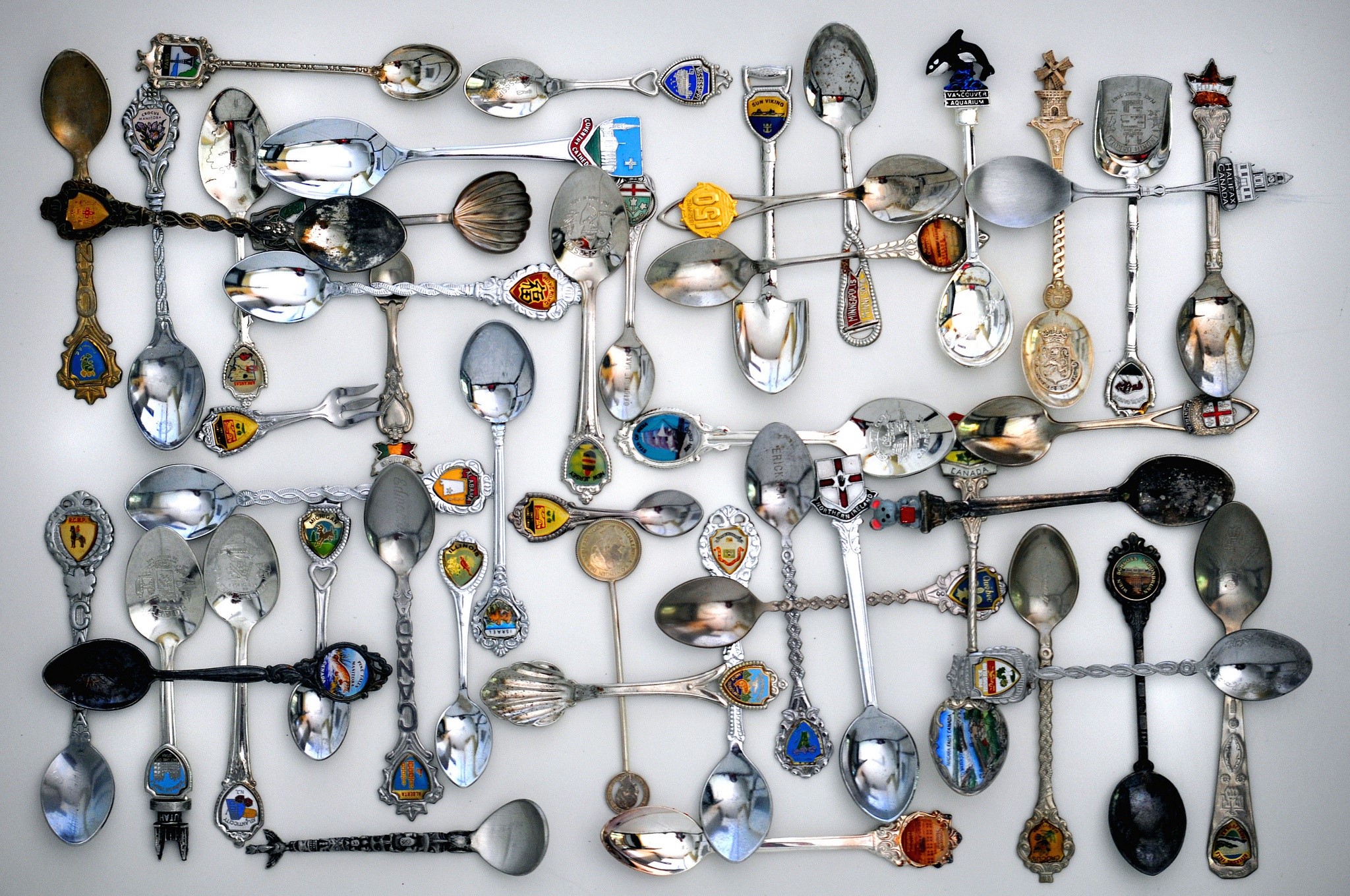 Collection of souvenir spoons HD Wallpaper