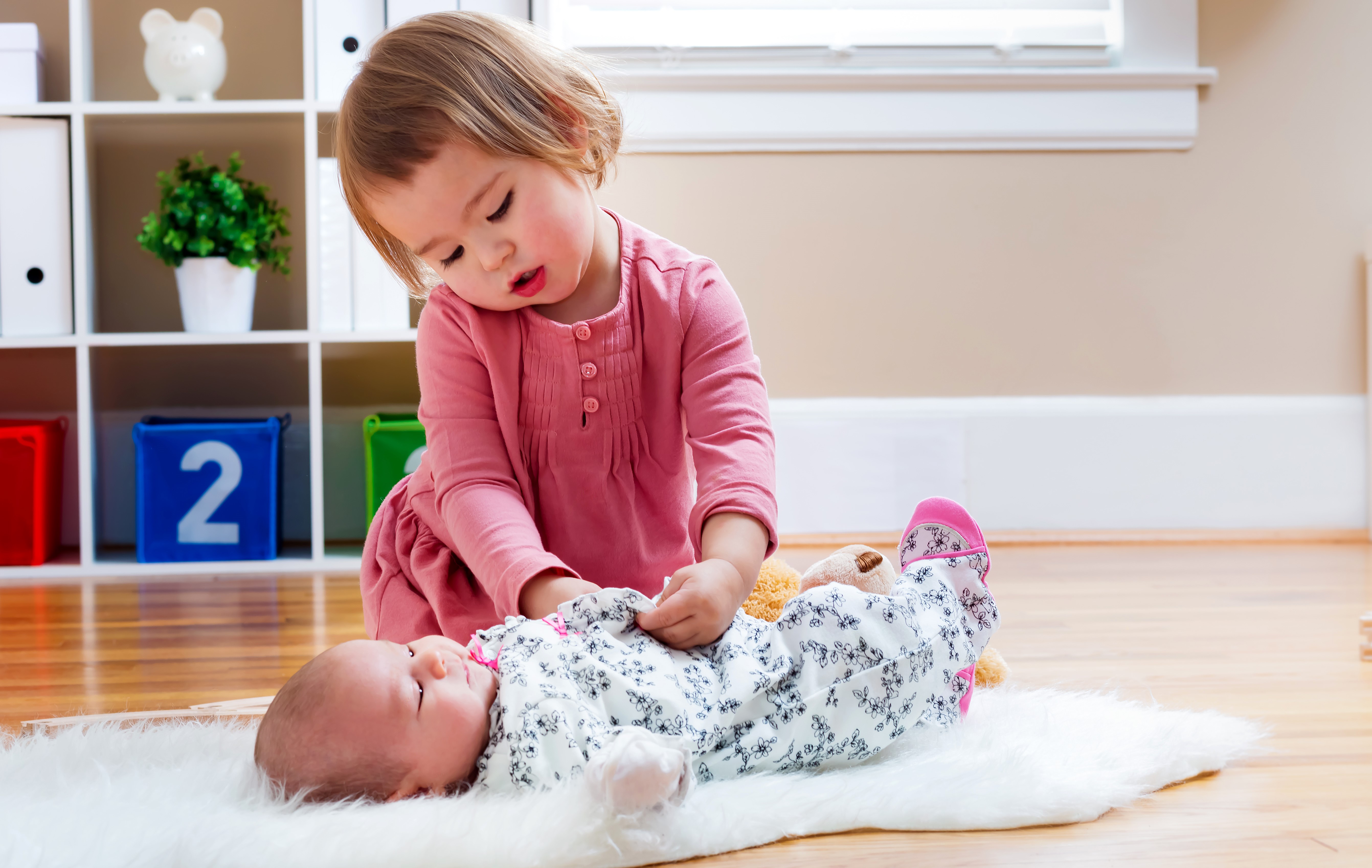 Two little girls and an infant HD Wallpaper