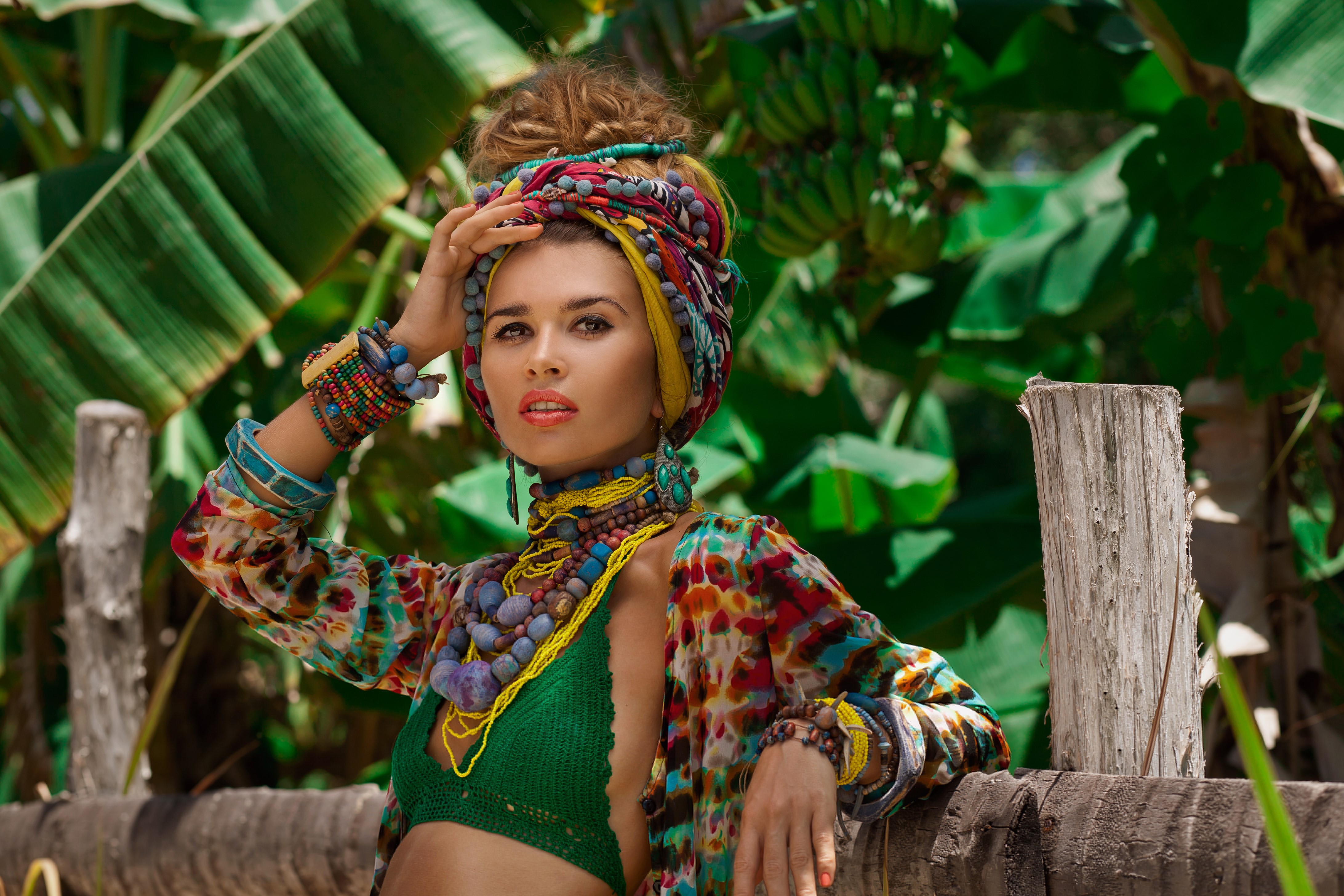 Woman with colorful headwrap and jewelry HD Wallpaper