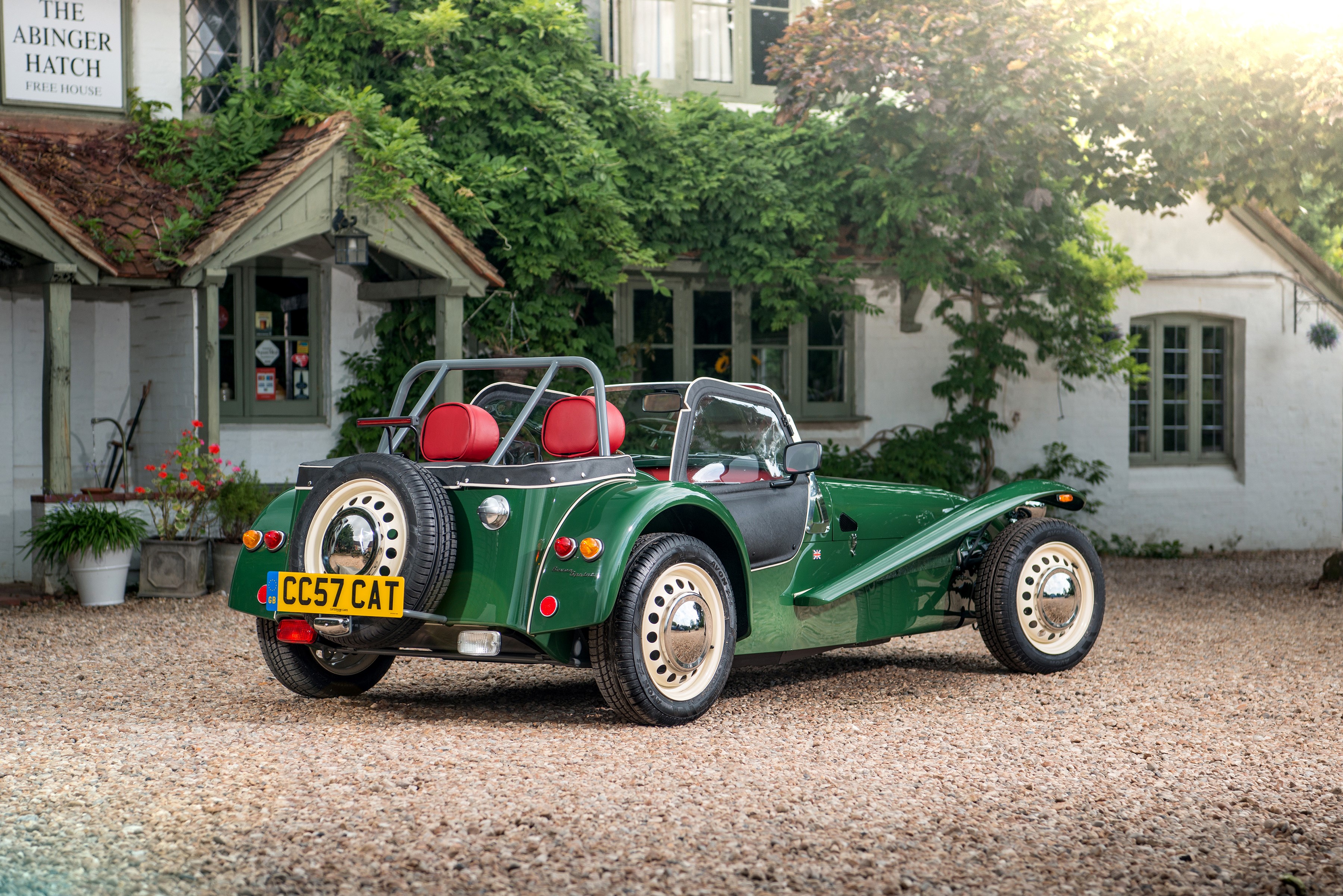 Green Caterham 7 with spare wheel HD Wallpaper