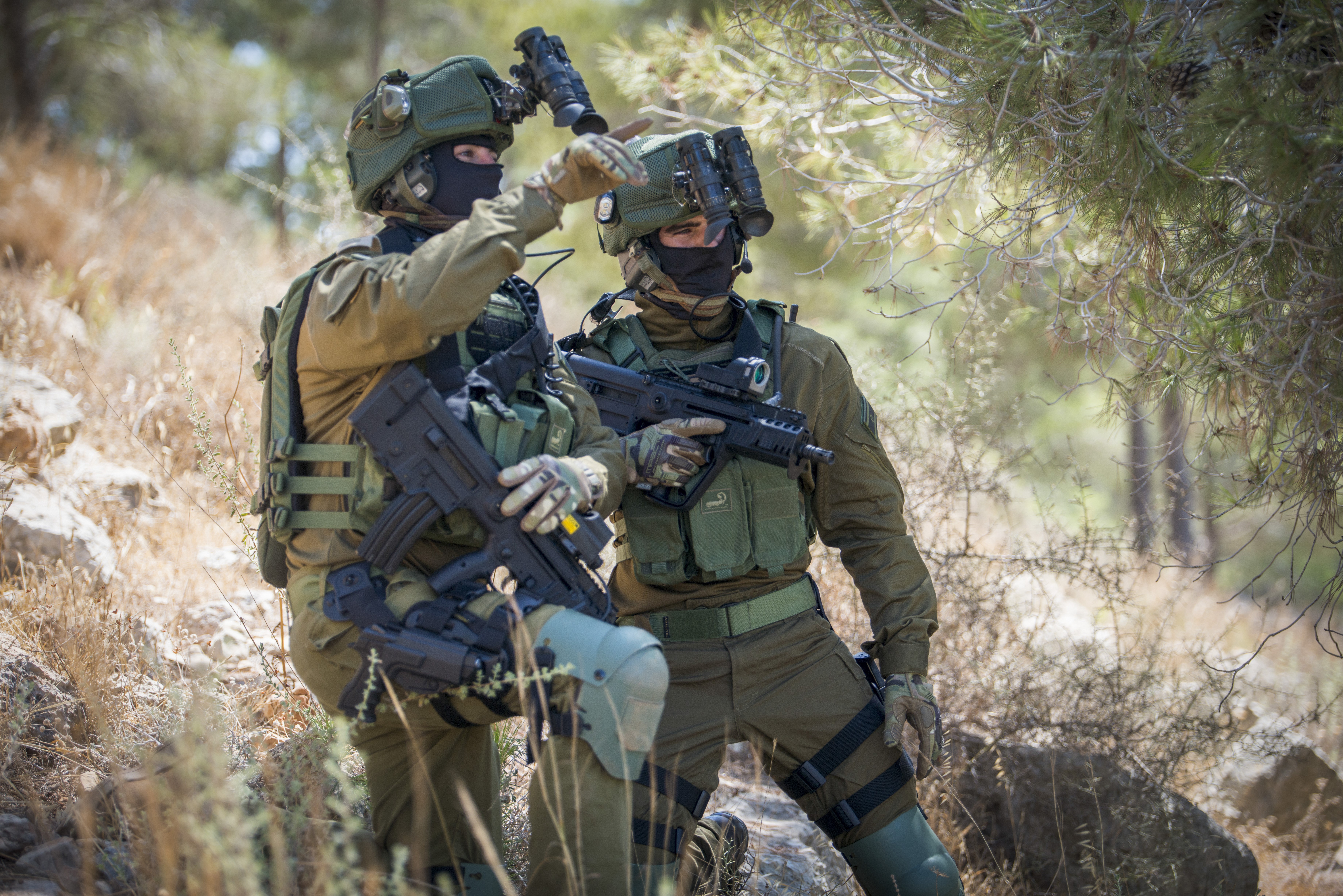 Soldiers with Assault Rifles and Military Helmets HD Wallpaper