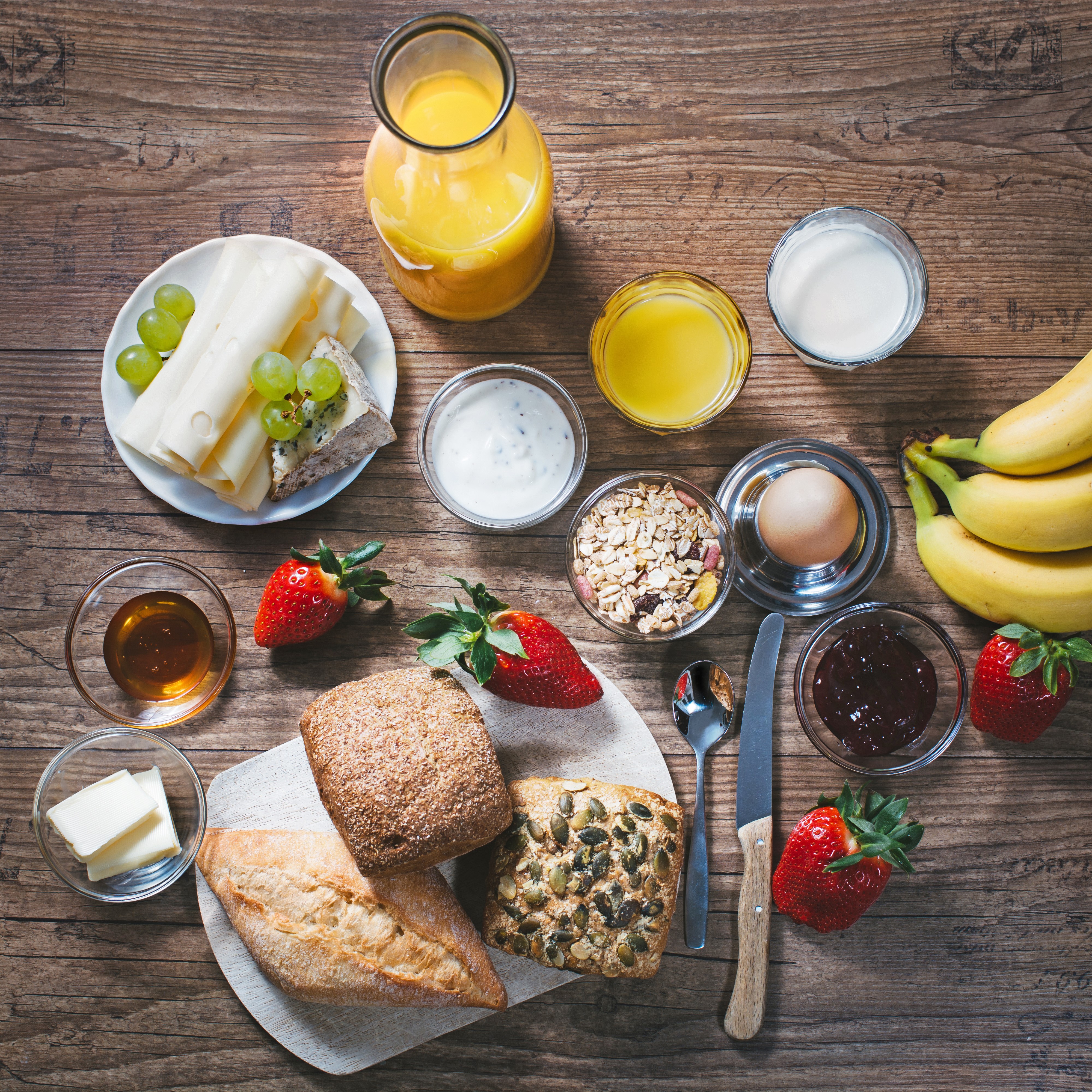 4K Breakfast Spread with Buns, Cheese, and Fruit HD Wallpaper