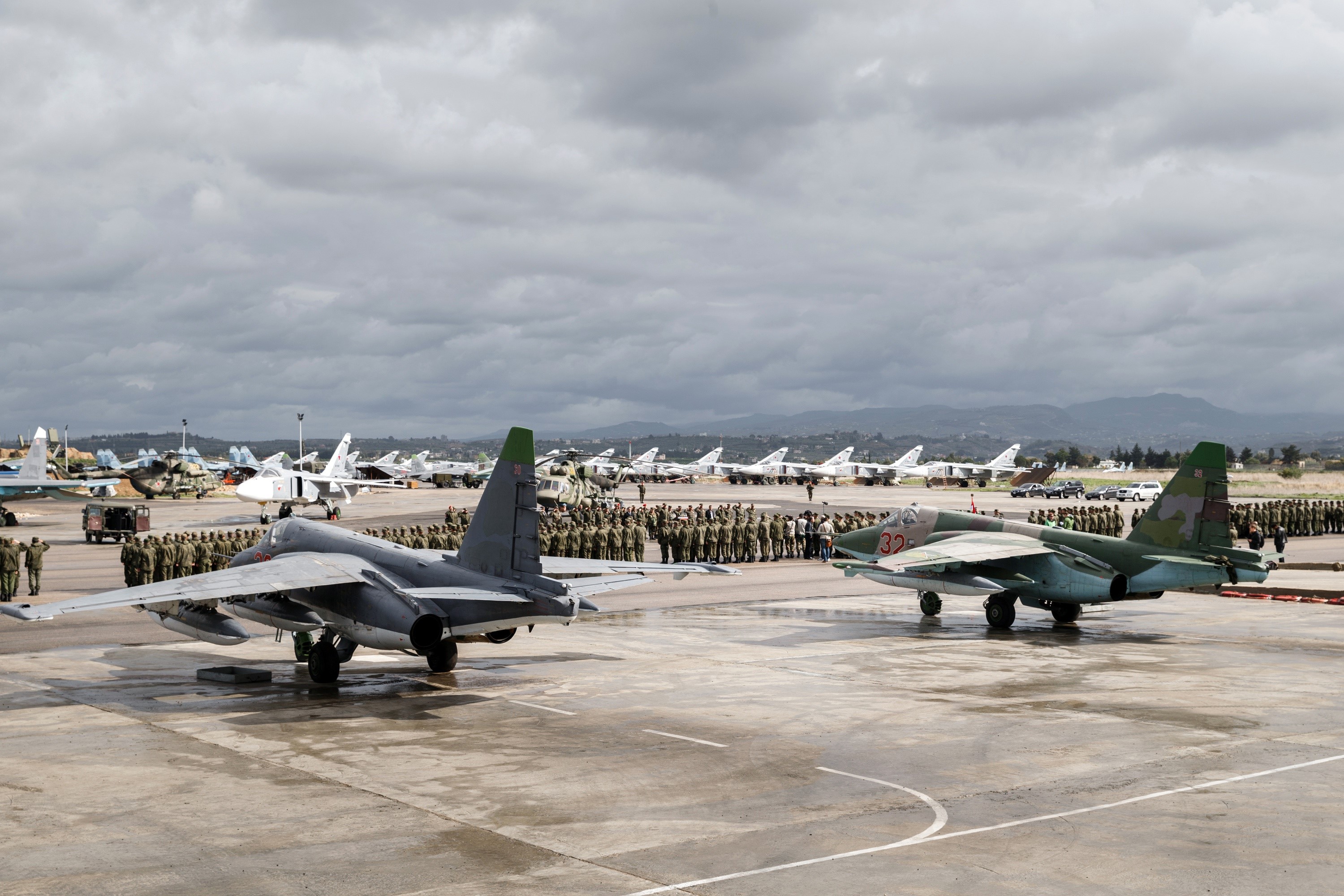 Russian Su-24M and Su-25CM aircraft on tarmac in Syria HD Wallpaper