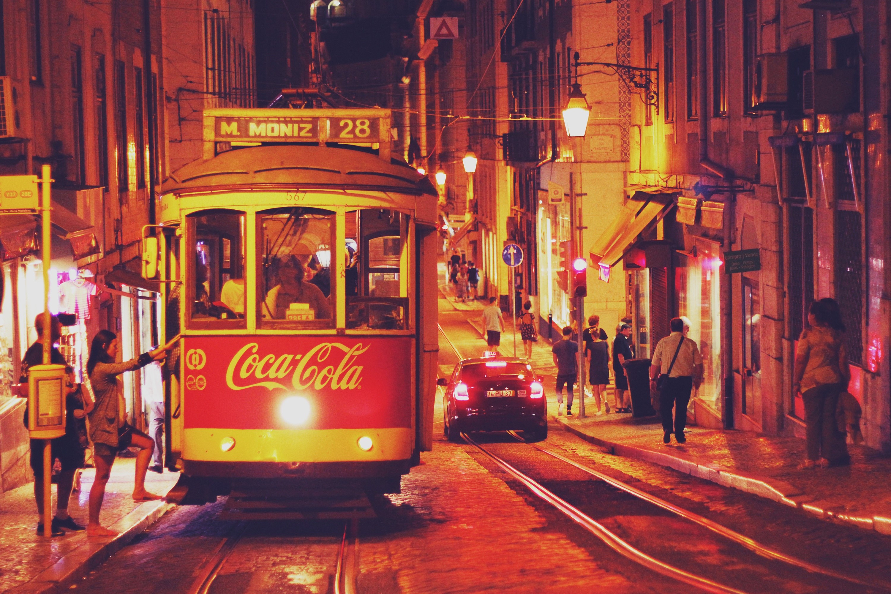 Coca-Cola Tram in Lisbon at Night HD Wallpaper