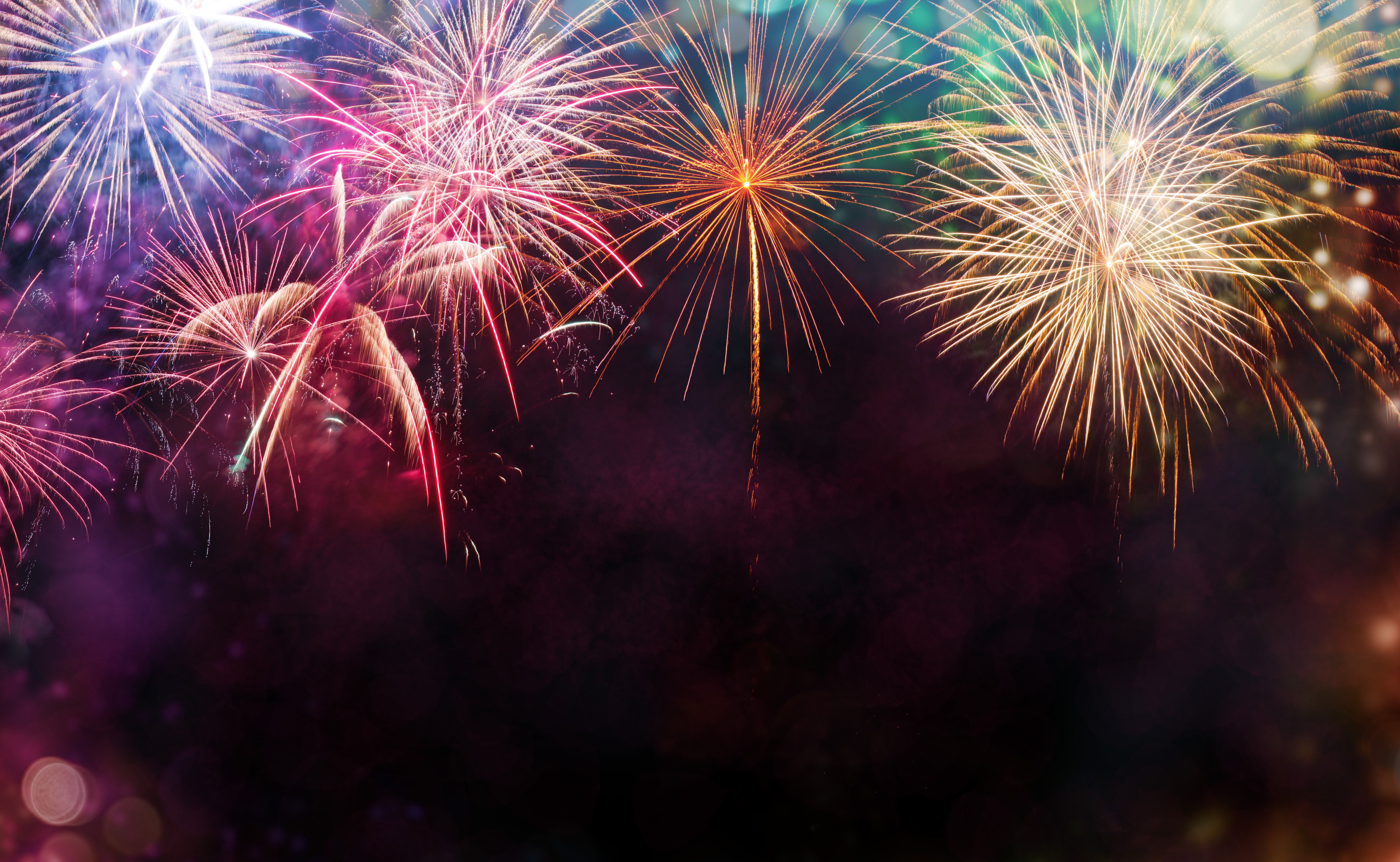 Fireworks display in the night sky HD Wallpaper