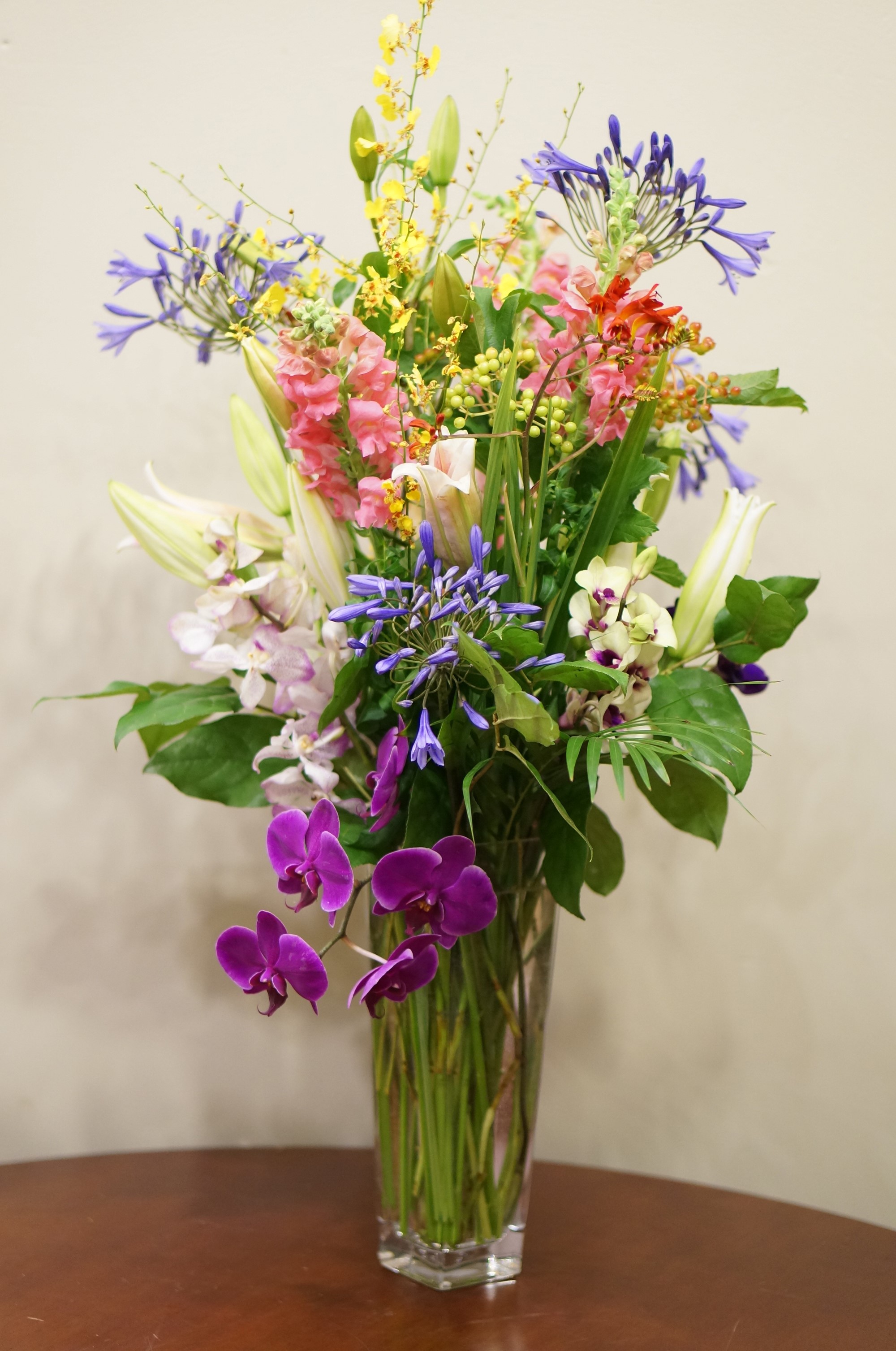 Orchid and Lily Flower Arrangement in Vase HD Phone Wallpaper