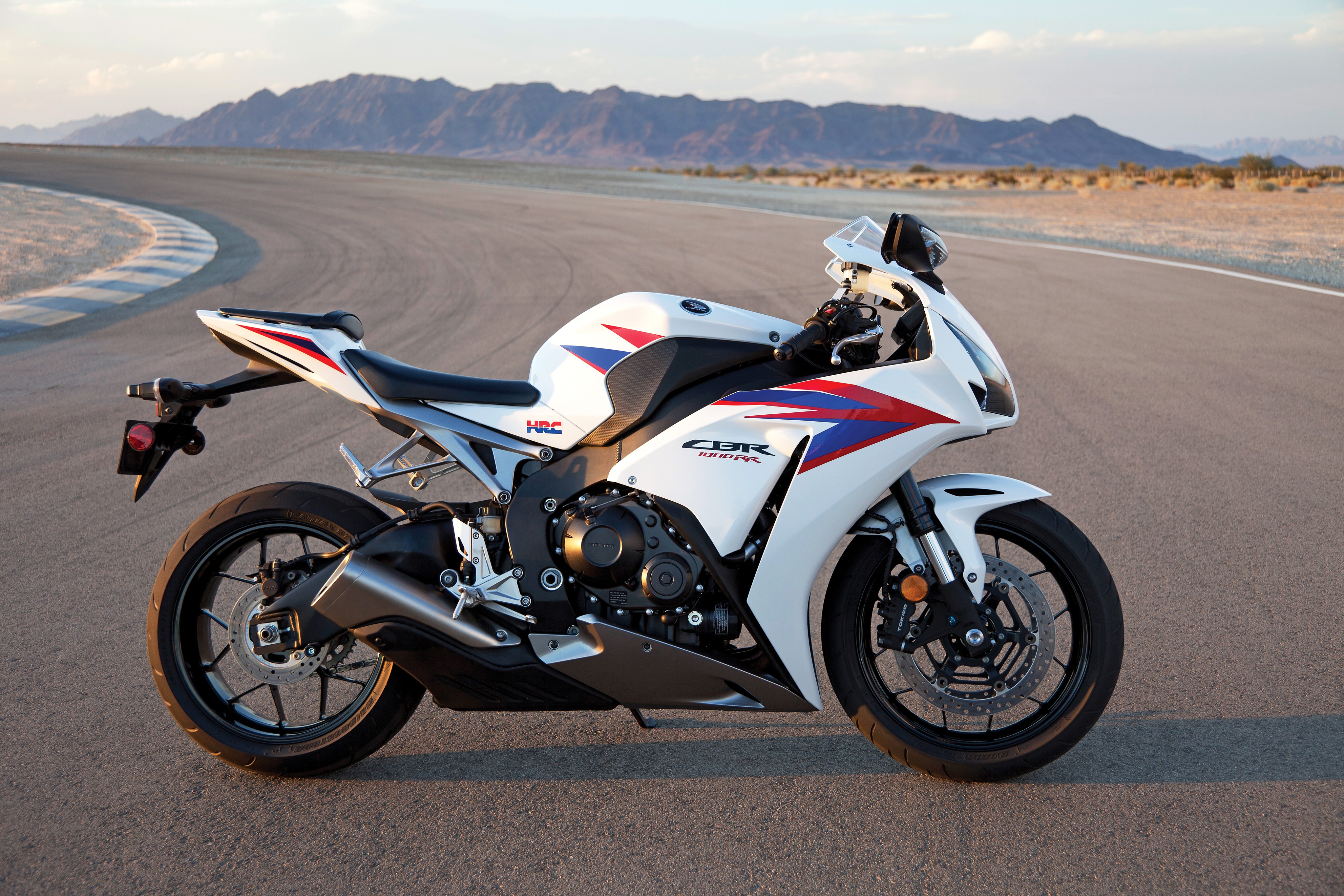 2012 Honda CBR1000RR Motorcycle on a Racetrack HD Wallpaper