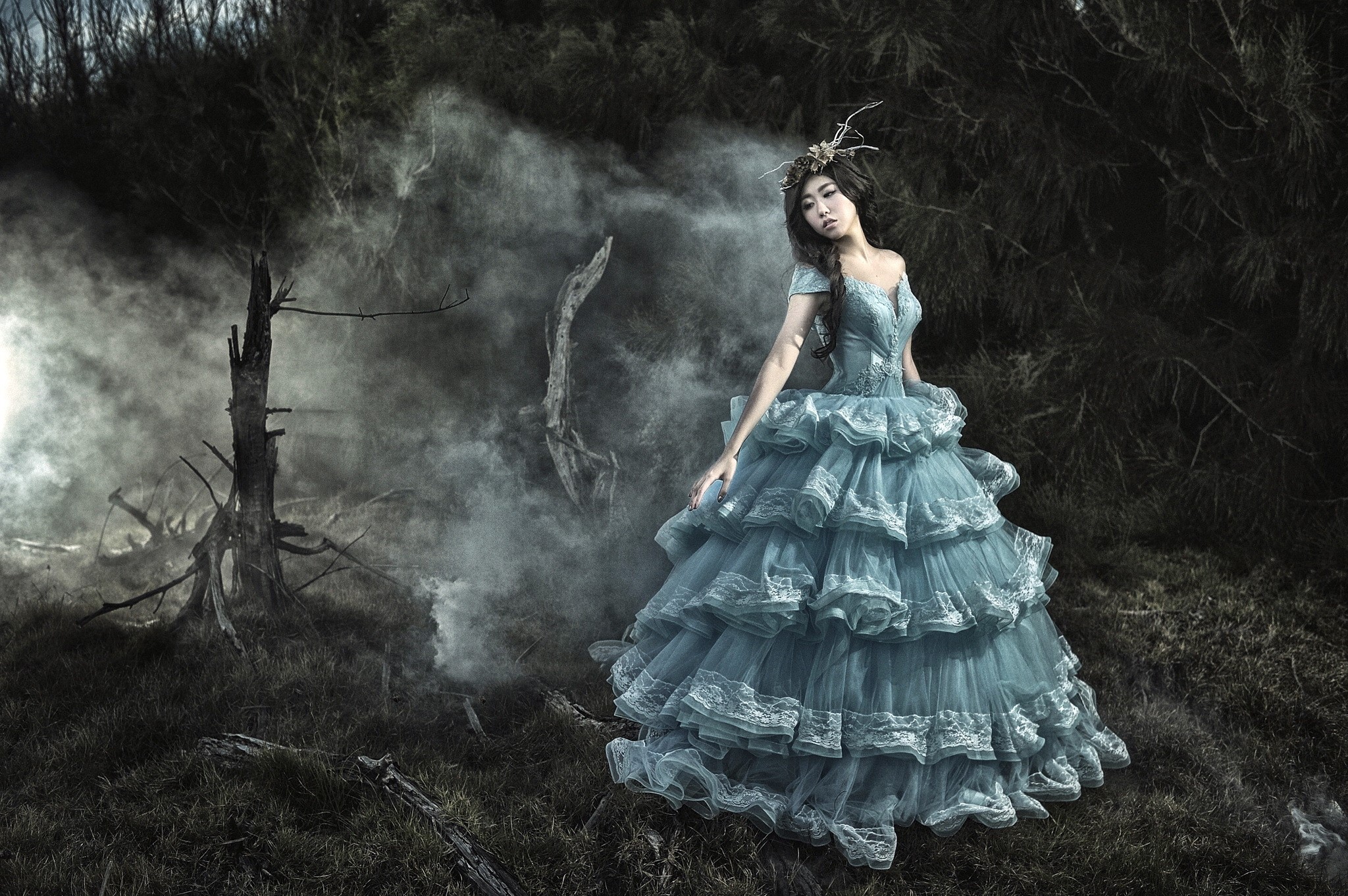 Asian woman in a blue gown in a dark forest HD Wallpaper