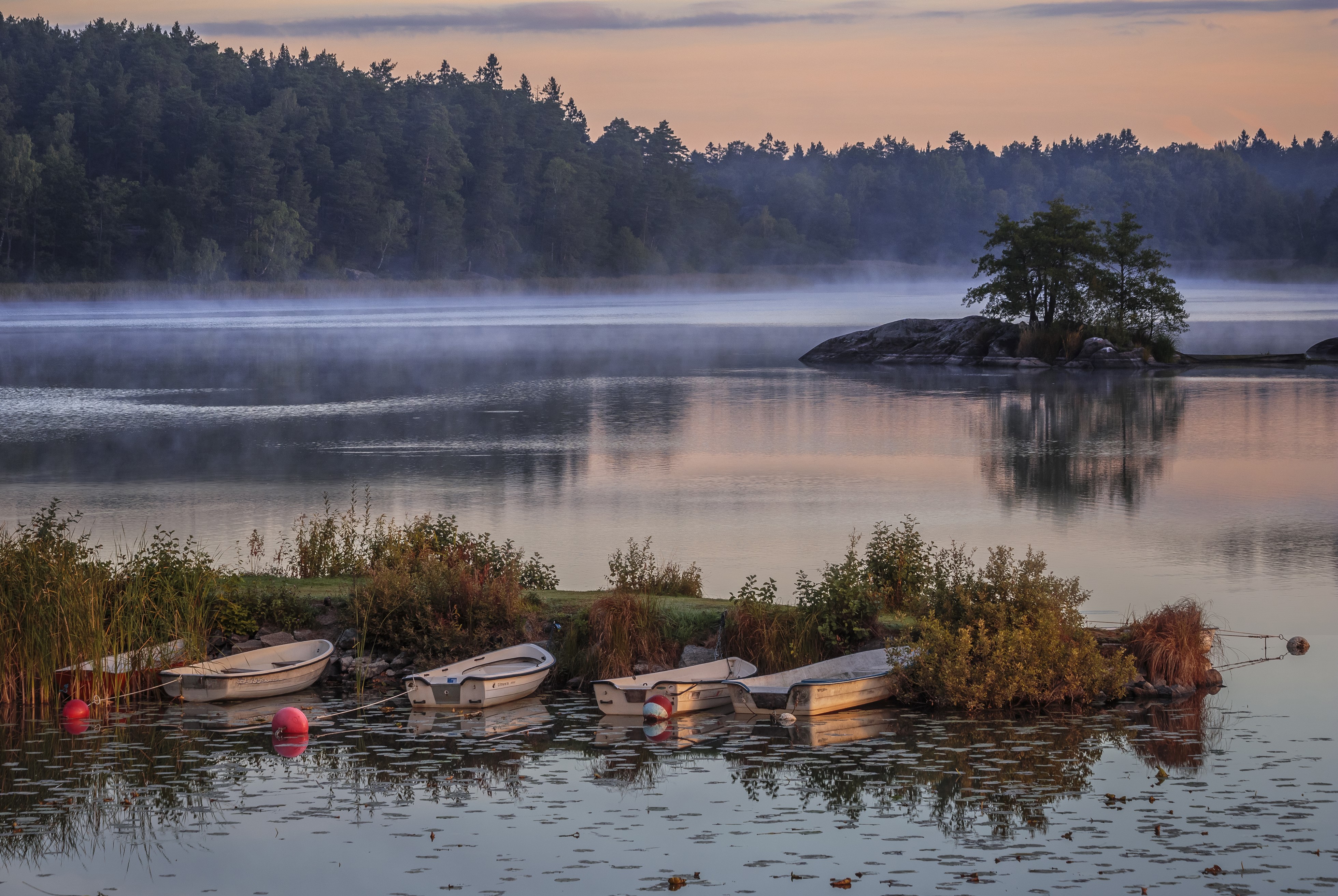 Boats on a foggy lake in Sweden HD Wallpaper