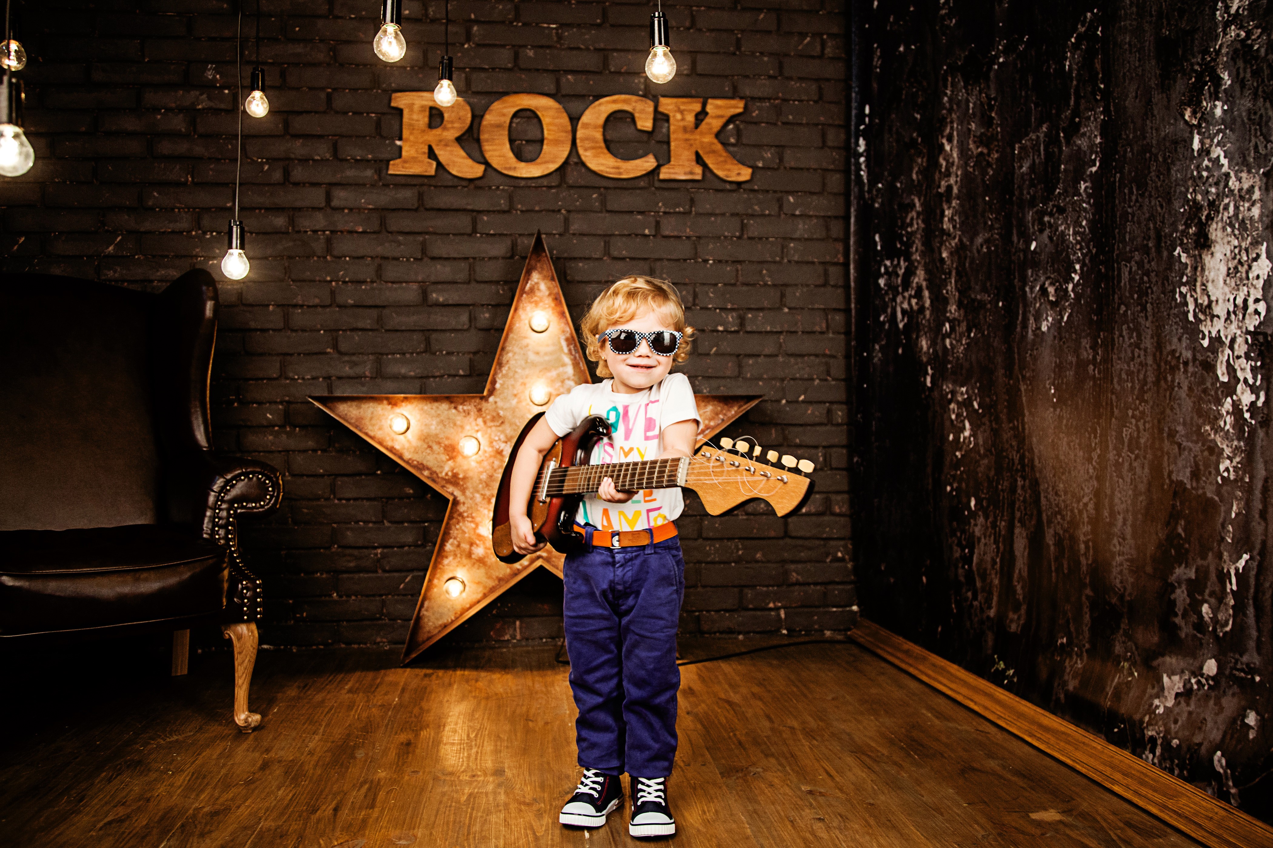 Boy with Guitar and Sunglasses HD Wallpaper