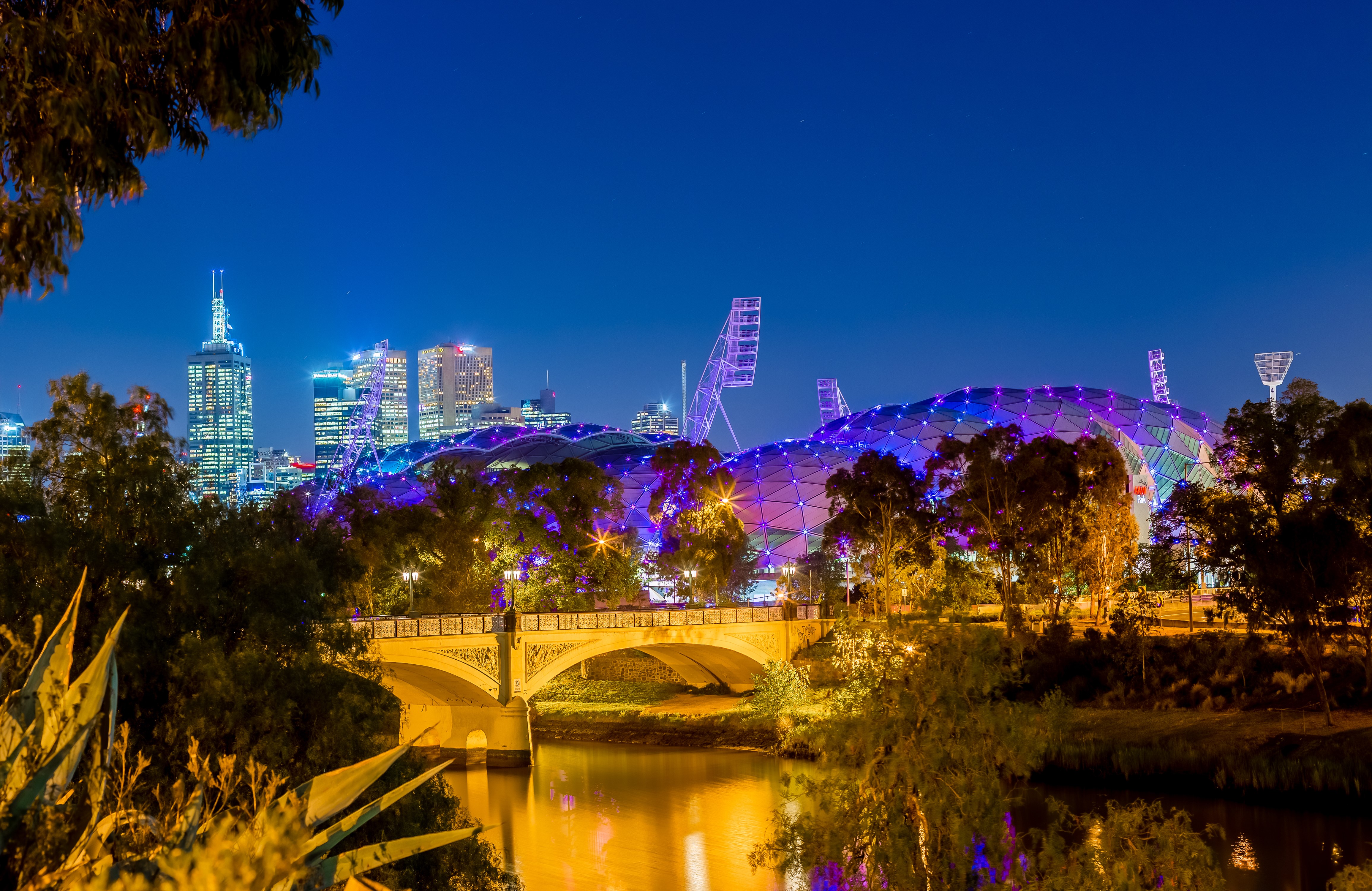 Melbourne Skyline with Stadium and Bridge at Night HD Wallpaper