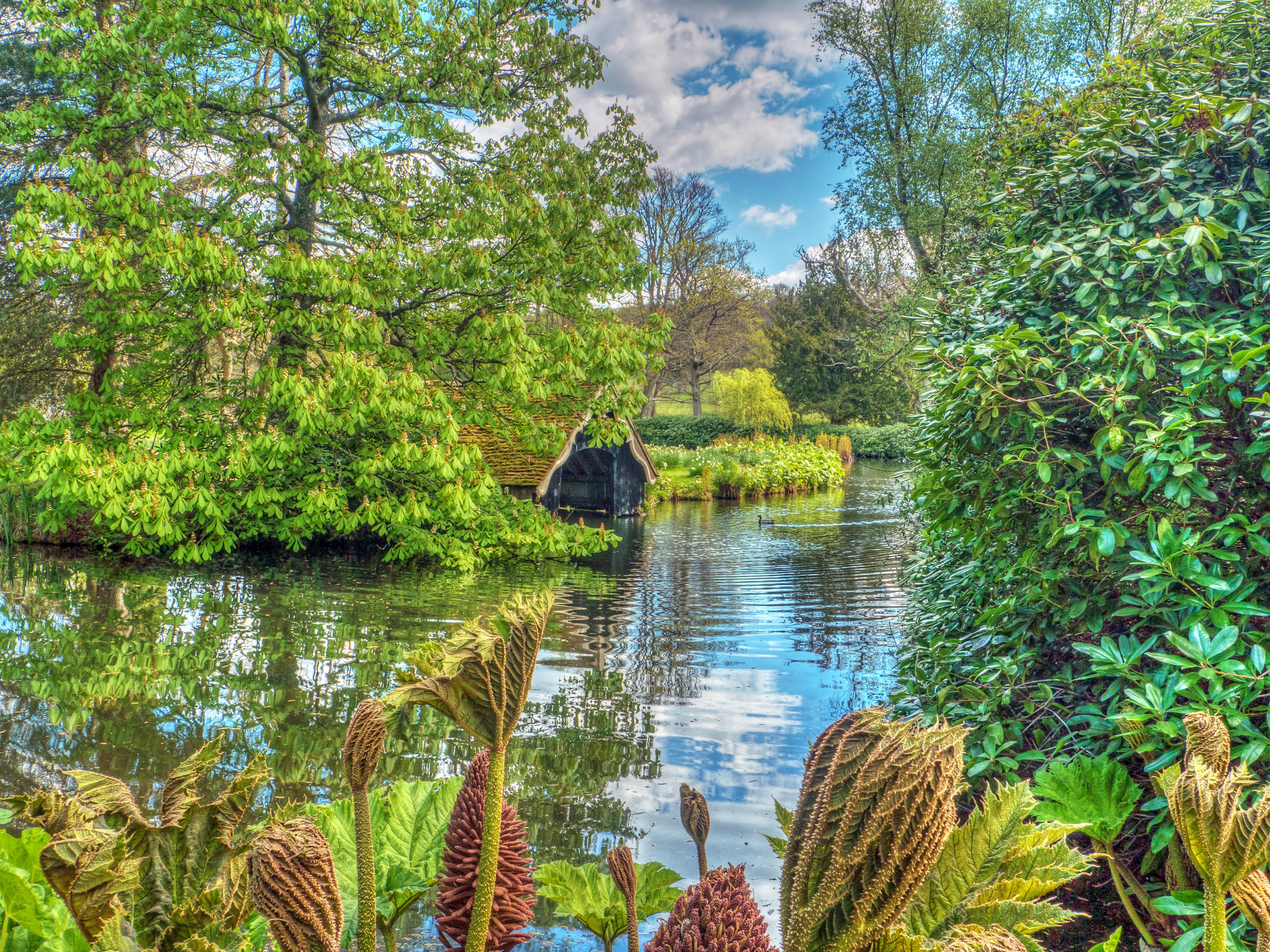 Boathouse on a pond at Scotney Castle Park, England HD Wallpaper