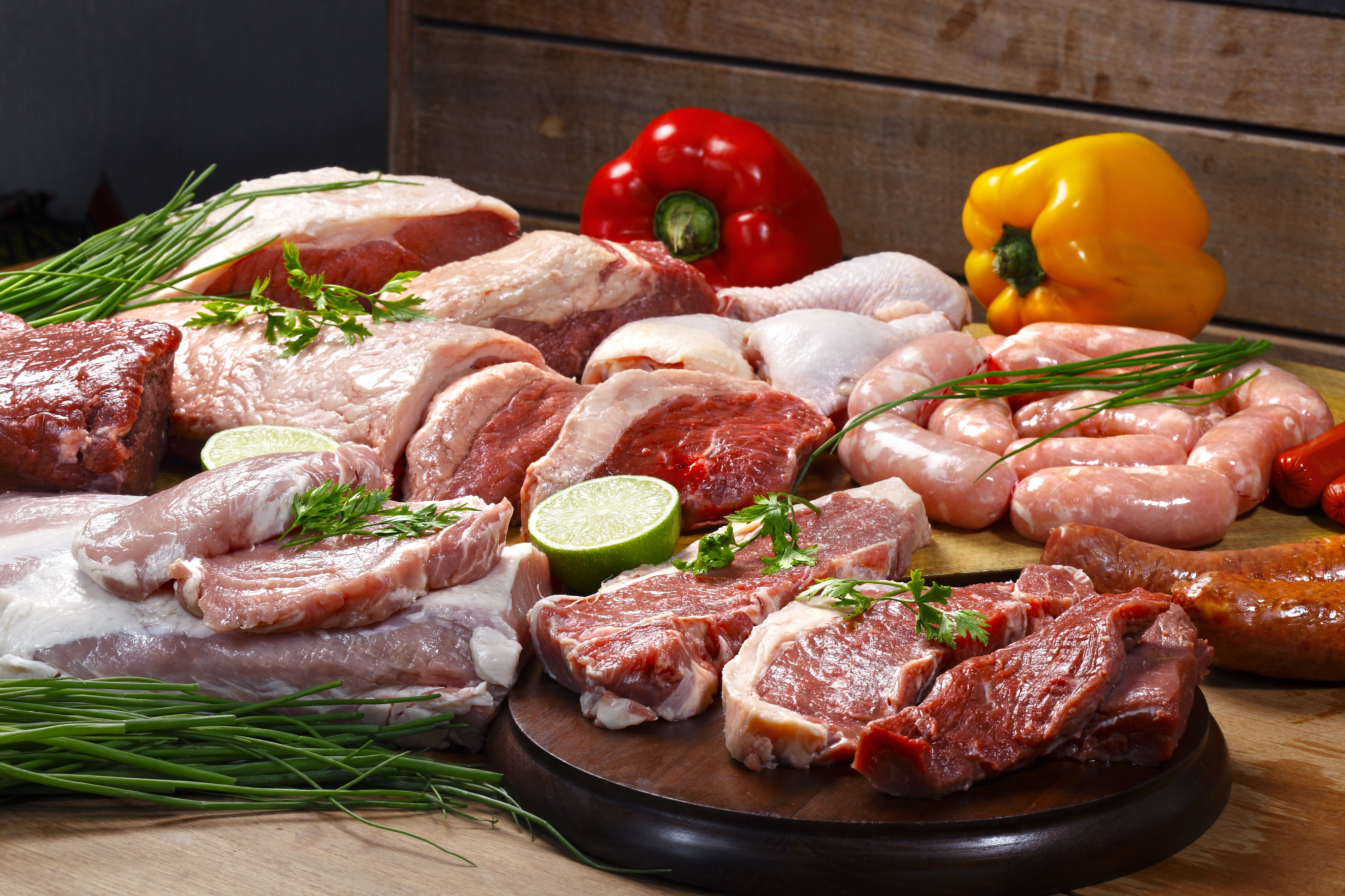 Assortment of raw meats and sausages HD Wallpaper