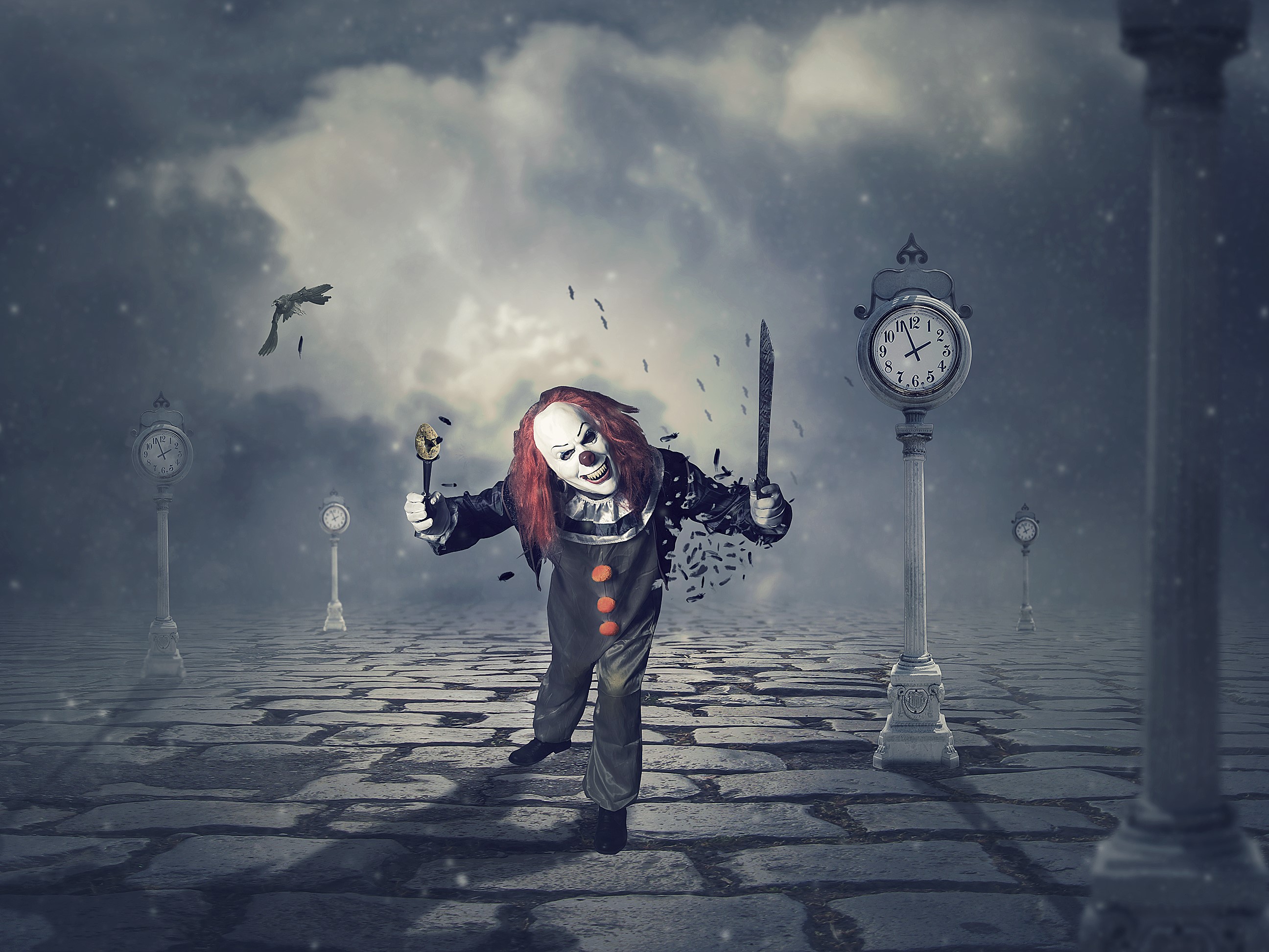Horrible clown with knife and mask in a surreal landscape HD Wallpaper